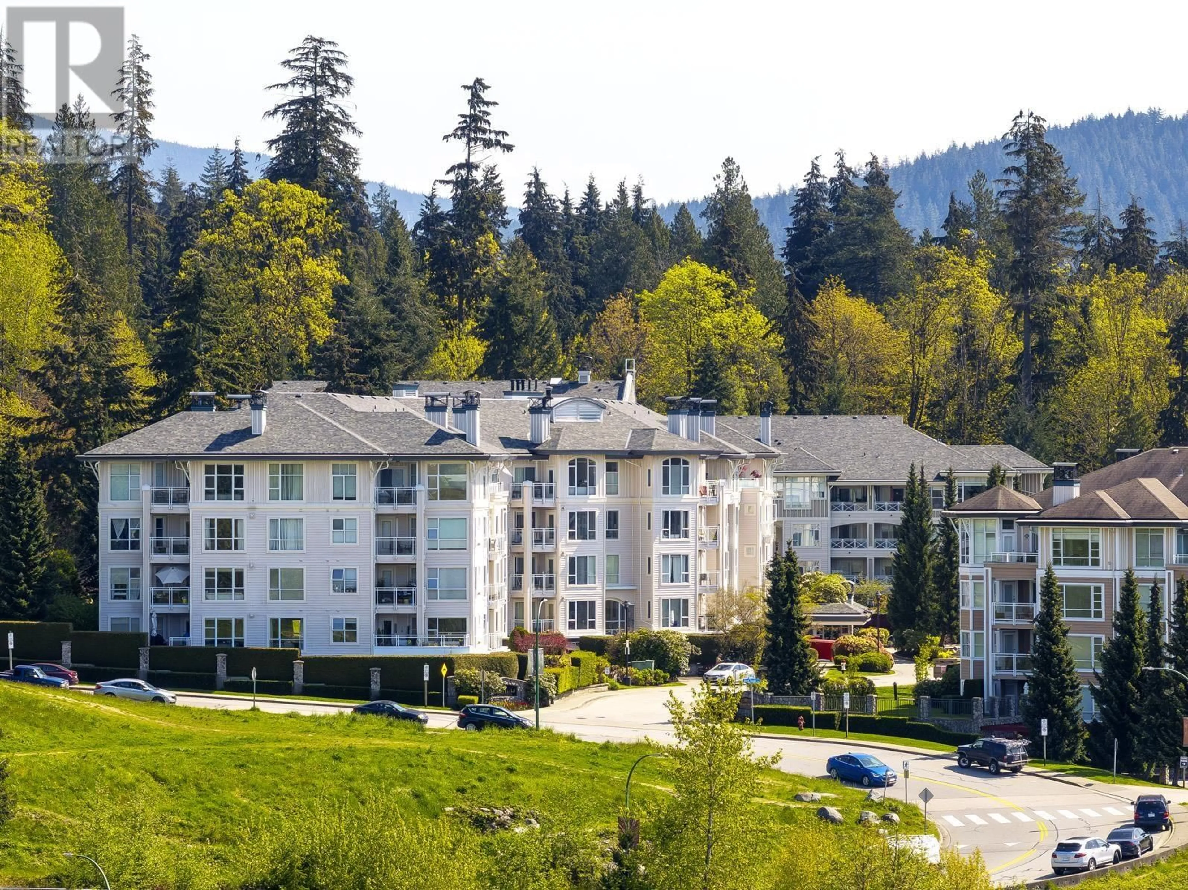 A pic from outside/outdoor area/front of a property/back of a property/a pic from drone, mountain view for 306 - 3608 DEERCREST COURT, North Vancouver British Columbia V7G2S8