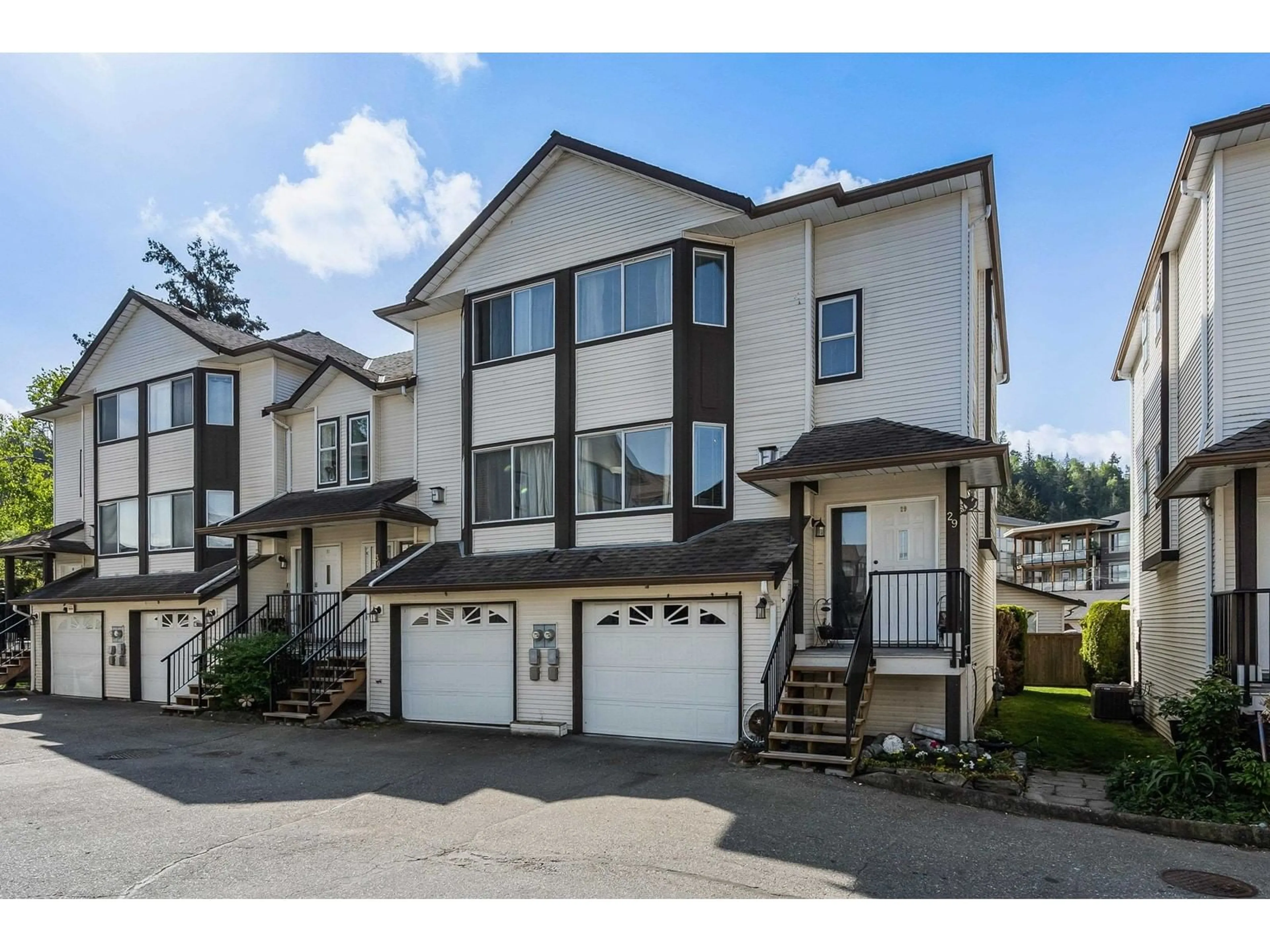 A pic from outside/outdoor area/front of a property/back of a property/a pic from drone, street for 29 - 45740 THOMAS ROAD, Chilliwack British Columbia V2R3V9