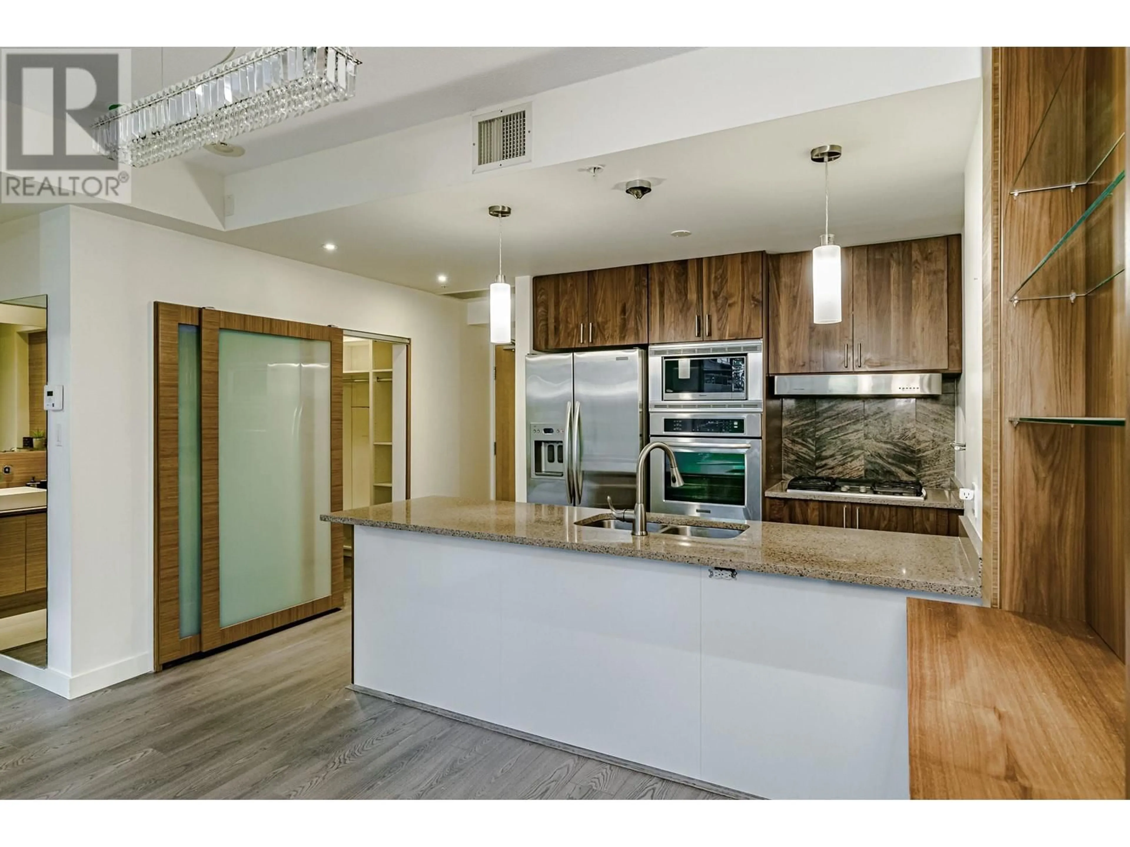 Open concept kitchen, unknown for 404 - 1211 MELVILLE STREET, Vancouver British Columbia V6E0A7