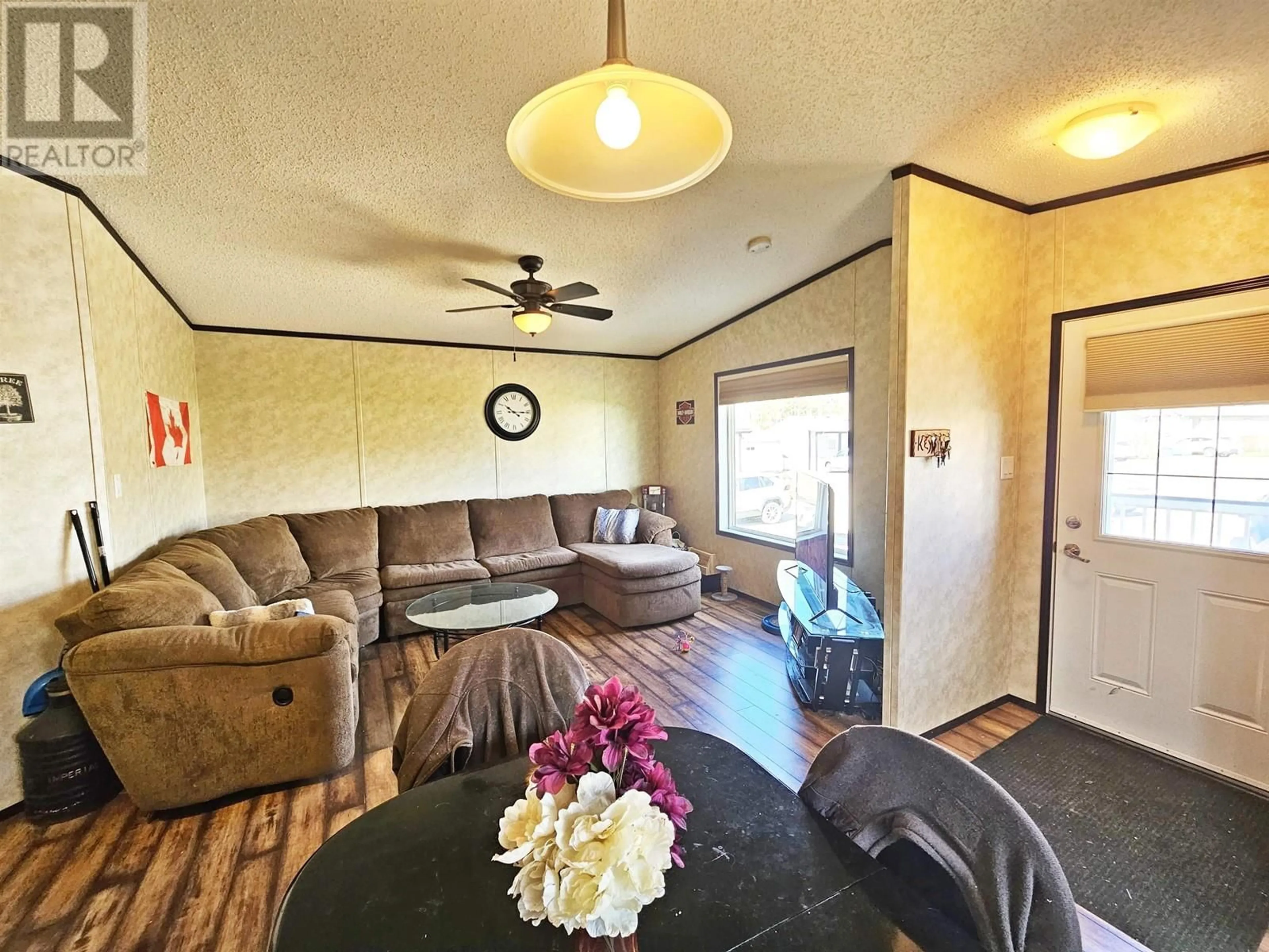 Living room with furniture, wood/laminate floor for 2510 ARIEL DAWN ROAD, Quesnel British Columbia V2J7A1