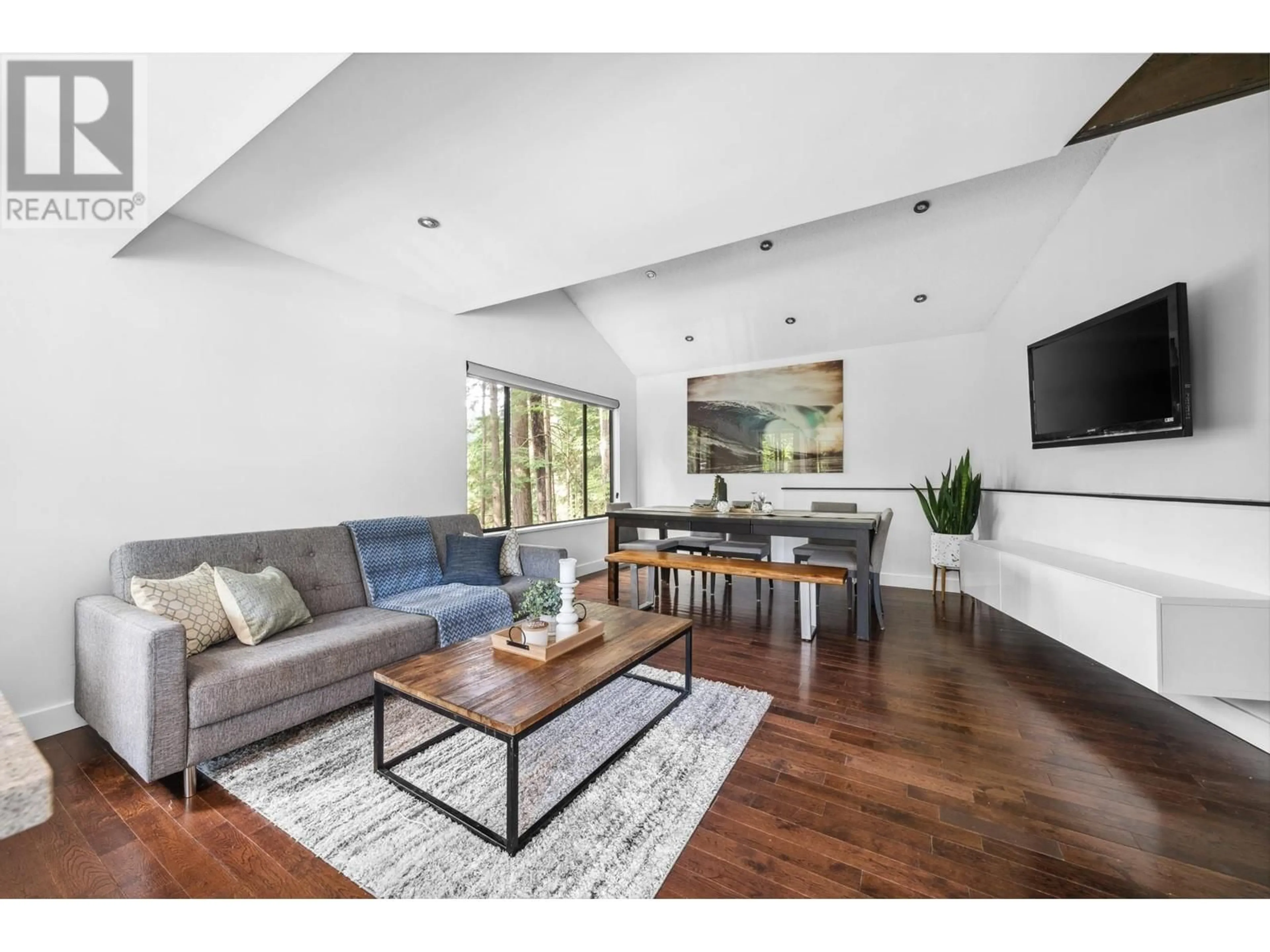 Living room with furniture, wood/laminate floor for 2086 RIVERGROVE PLACE, North Vancouver British Columbia V7H2L4