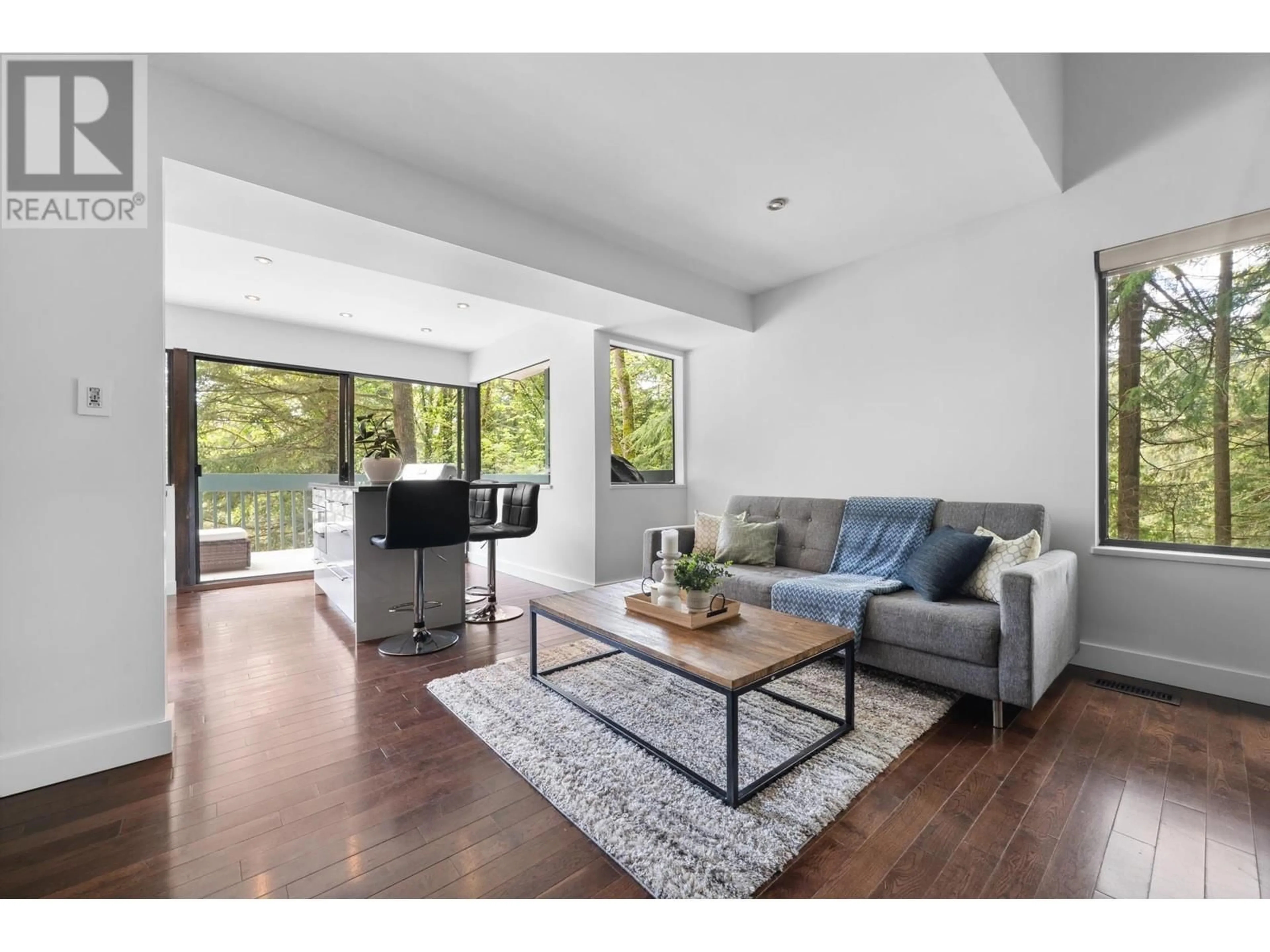 Living room with furniture, wood/laminate floor for 2086 RIVERGROVE PLACE, North Vancouver British Columbia V7H2L4