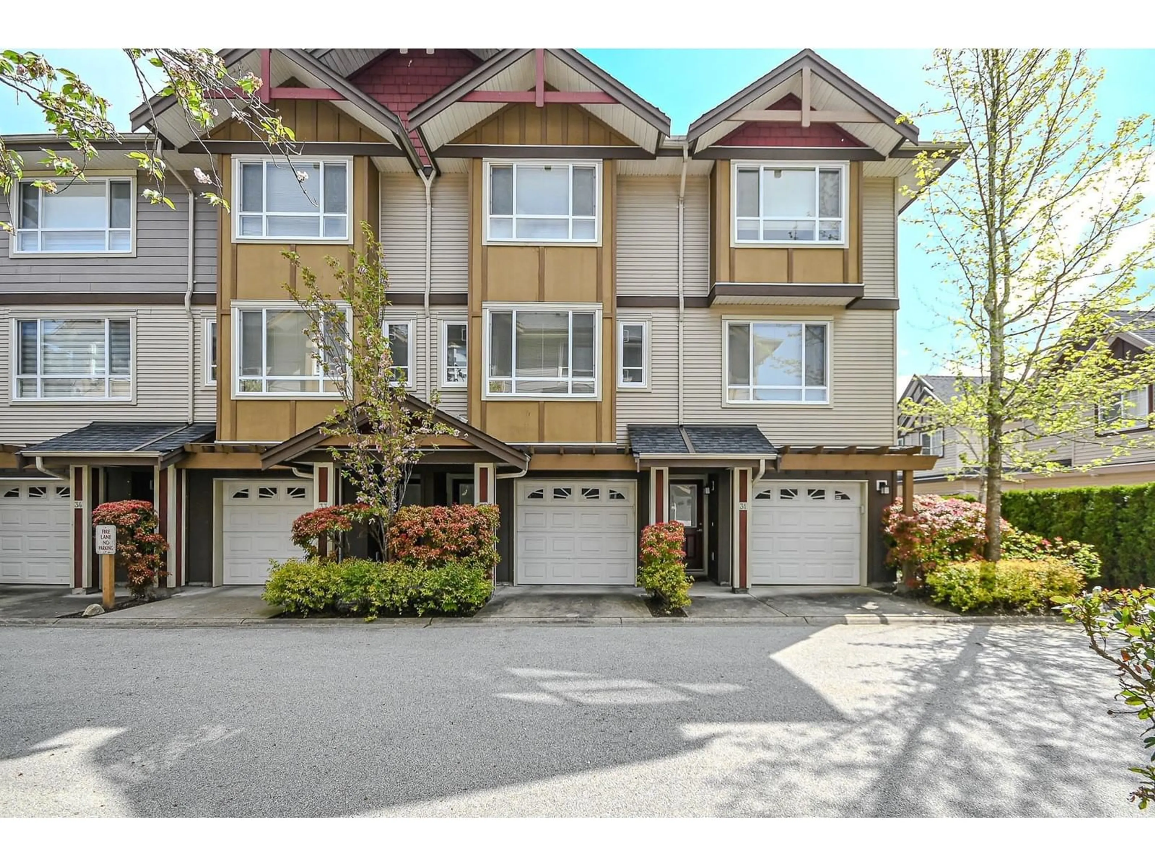 A pic from outside/outdoor area/front of a property/back of a property/a pic from drone, street for 32 - 7088 191, Surrey British Columbia V4N0B4