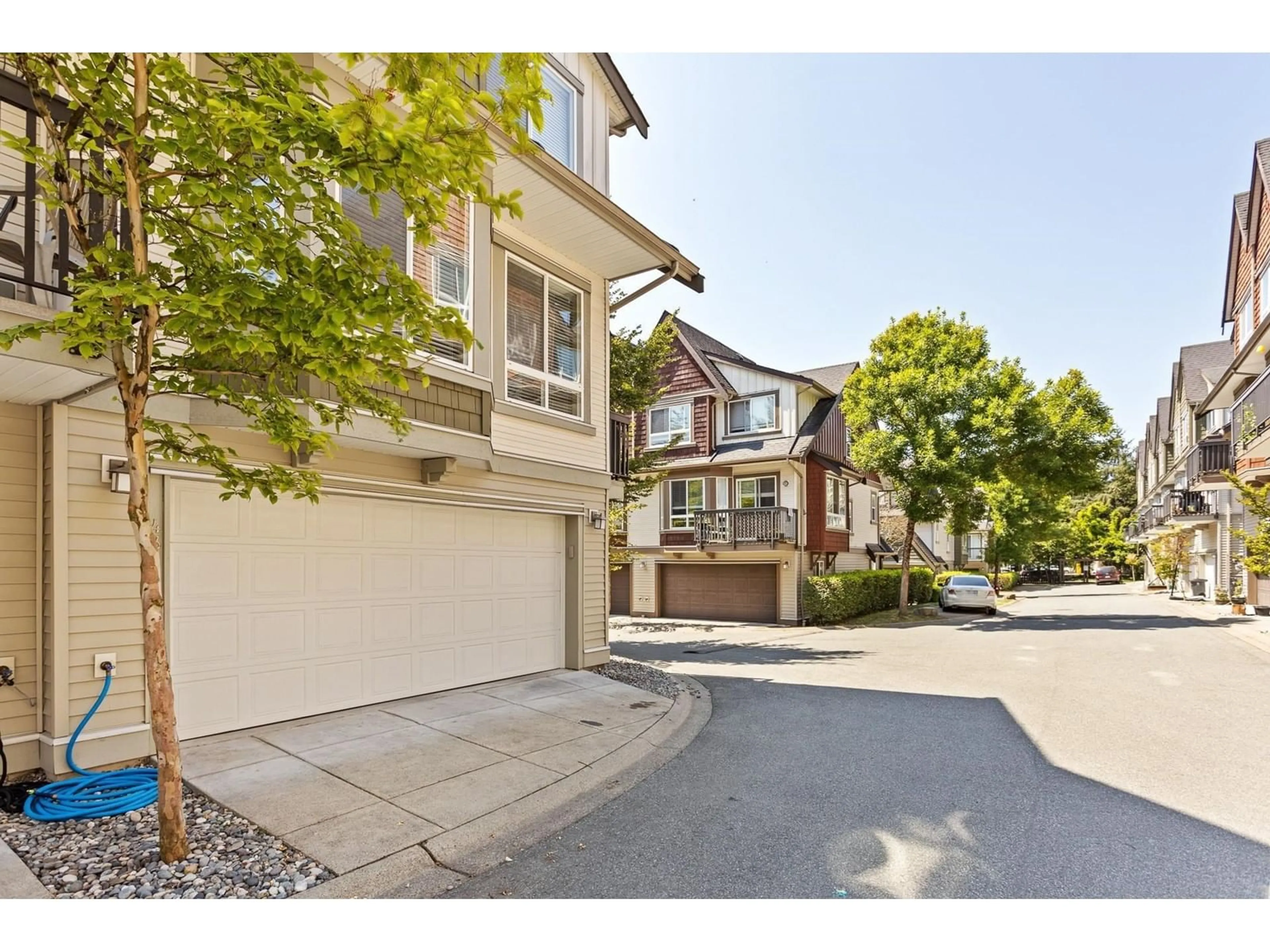 A pic from outside/outdoor area/front of a property/back of a property/a pic from drone, street for 43 - 7155 189, Surrey British Columbia V4N5S8