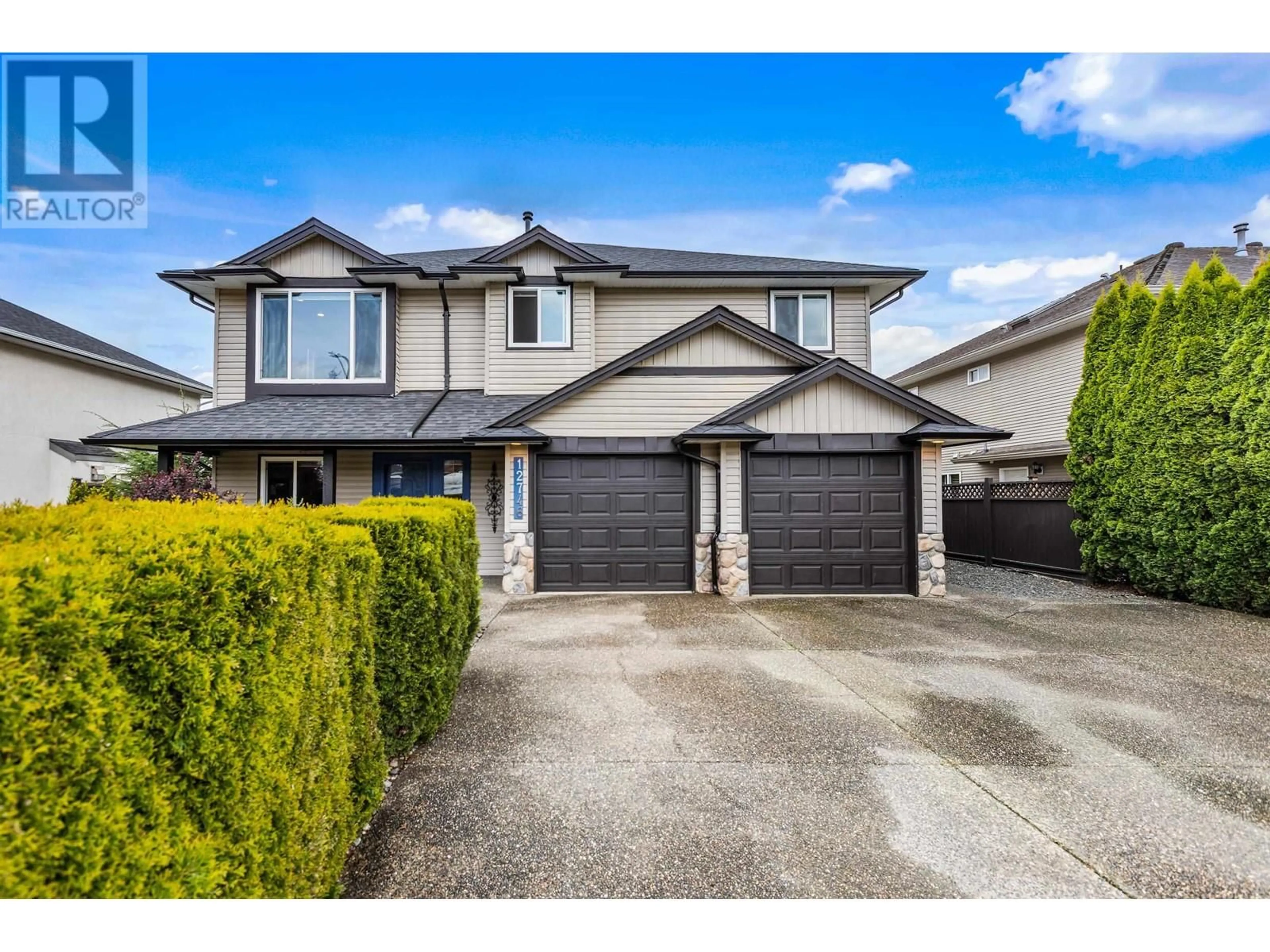 Home with vinyl exterior material, street for 12746 228 STREET, Maple Ridge British Columbia V2X6N2