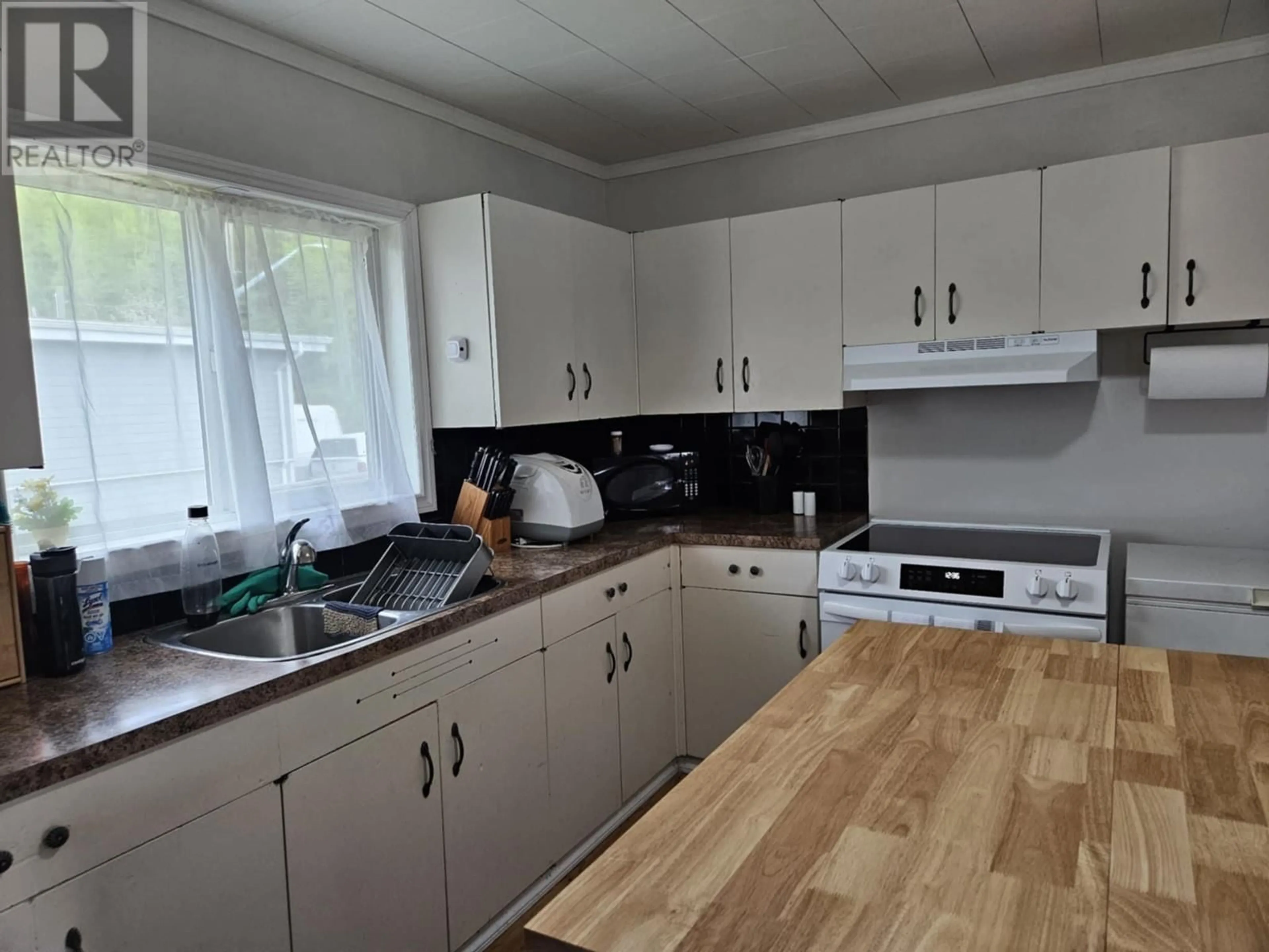 Standard kitchen, wood/laminate floor for 3701 KALUM STREET, Terrace British Columbia V8G2P6