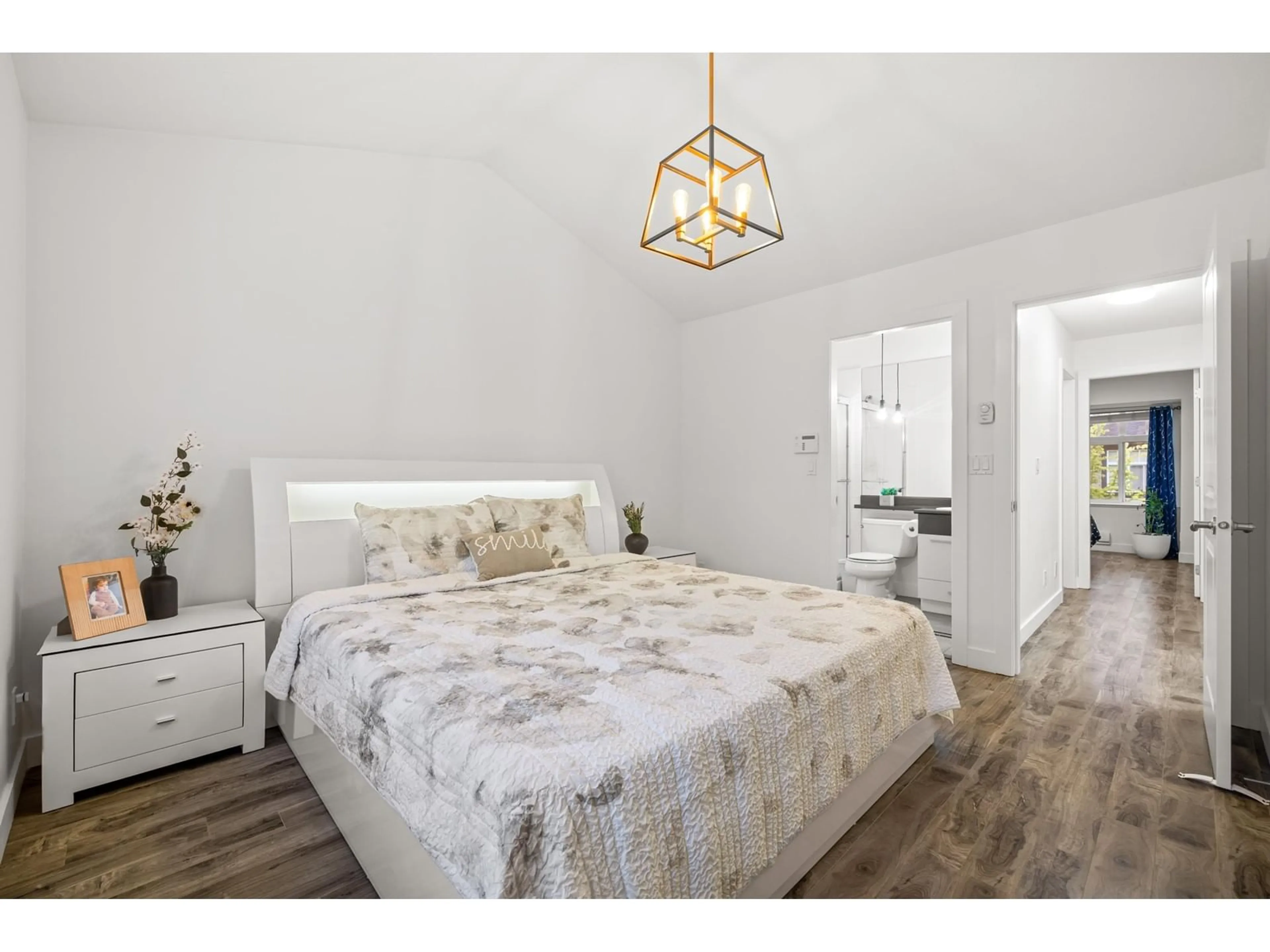 Bedroom with bed, wood/laminate floor for 4 - 19448 68, Surrey British Columbia V4N5V5