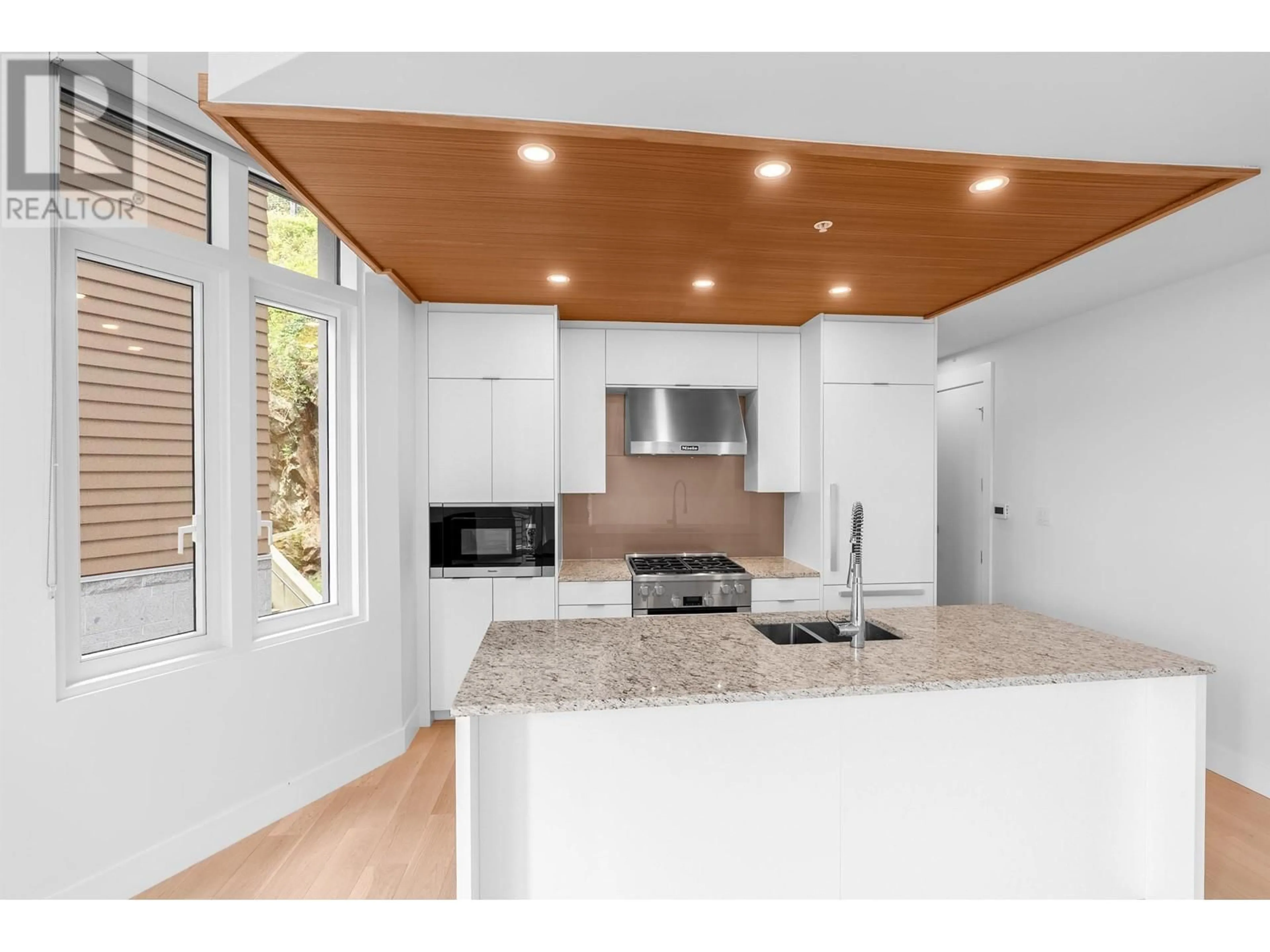 Open concept kitchen, unknown for 404 - 6699 NELSON AVENUE, West Vancouver British Columbia V7W2B2