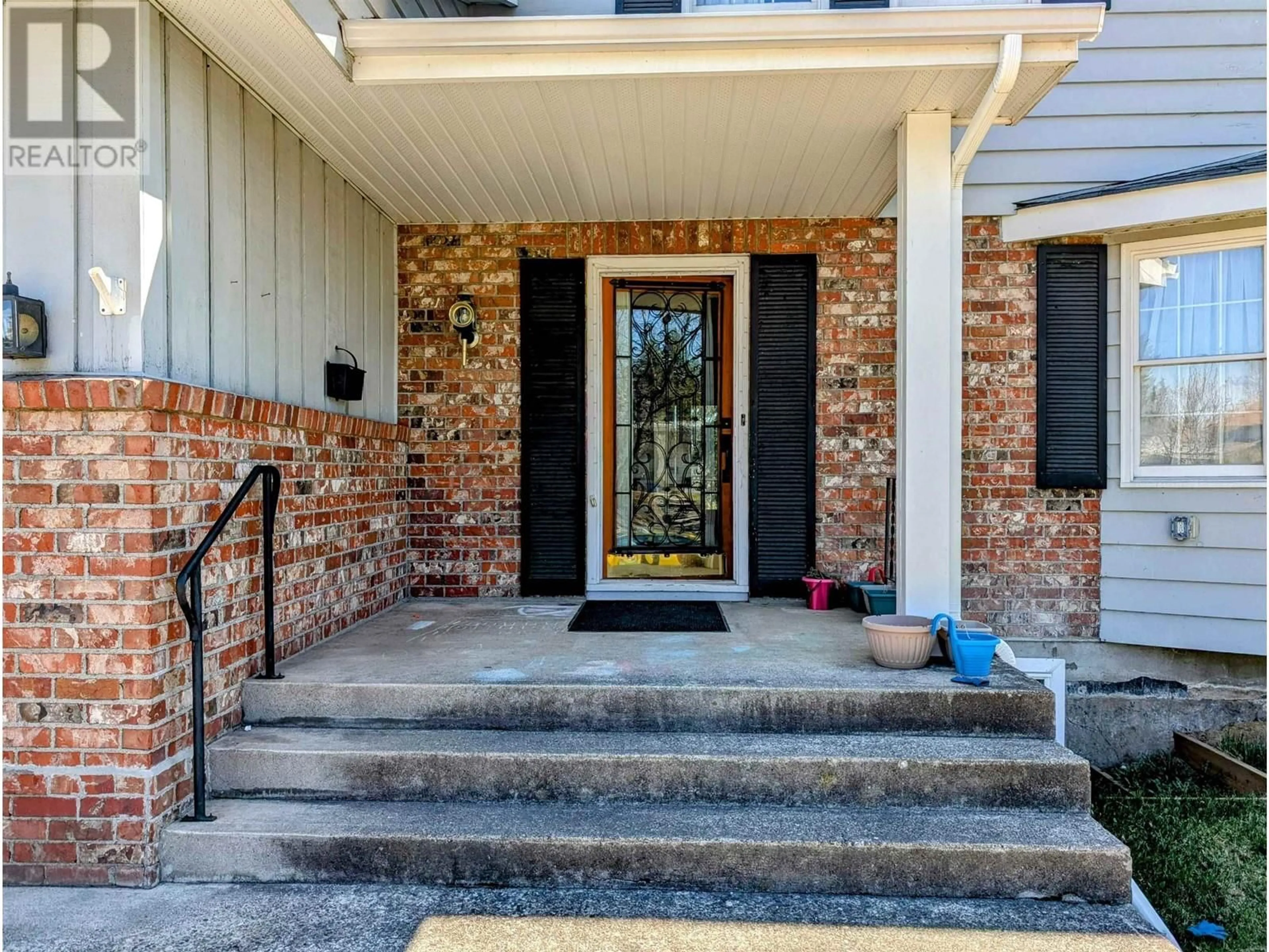 Home with brick exterior material, street for 1602 EDMONTON STREET, Prince George British Columbia V2M1X4