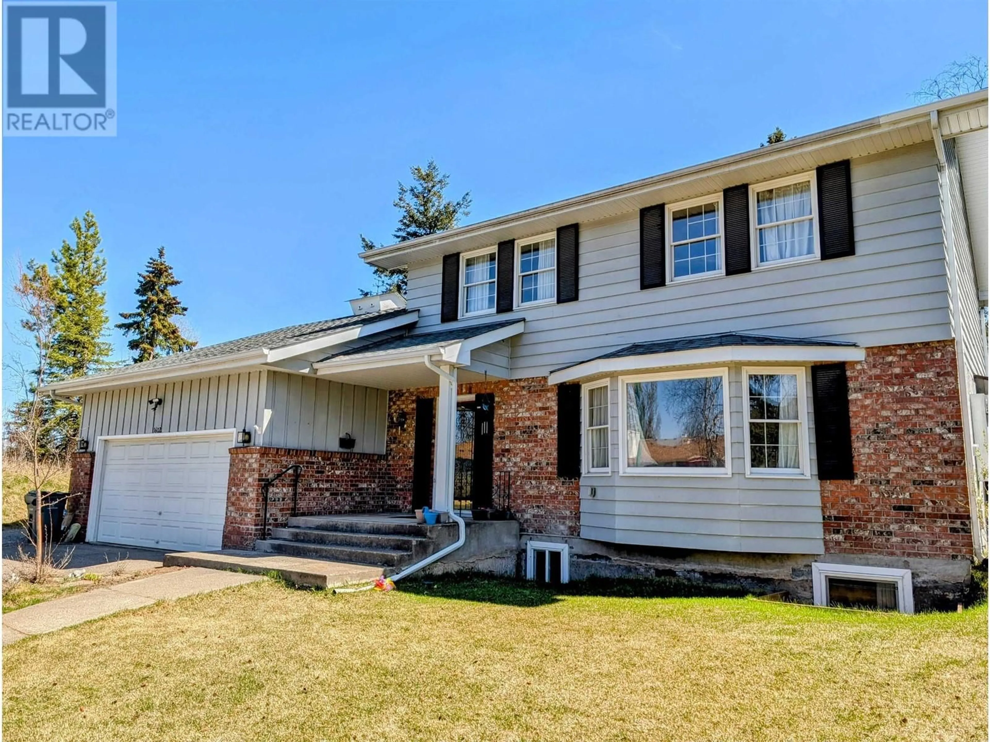 Home with vinyl exterior material, street for 1602 EDMONTON STREET, Prince George British Columbia V2M1X4