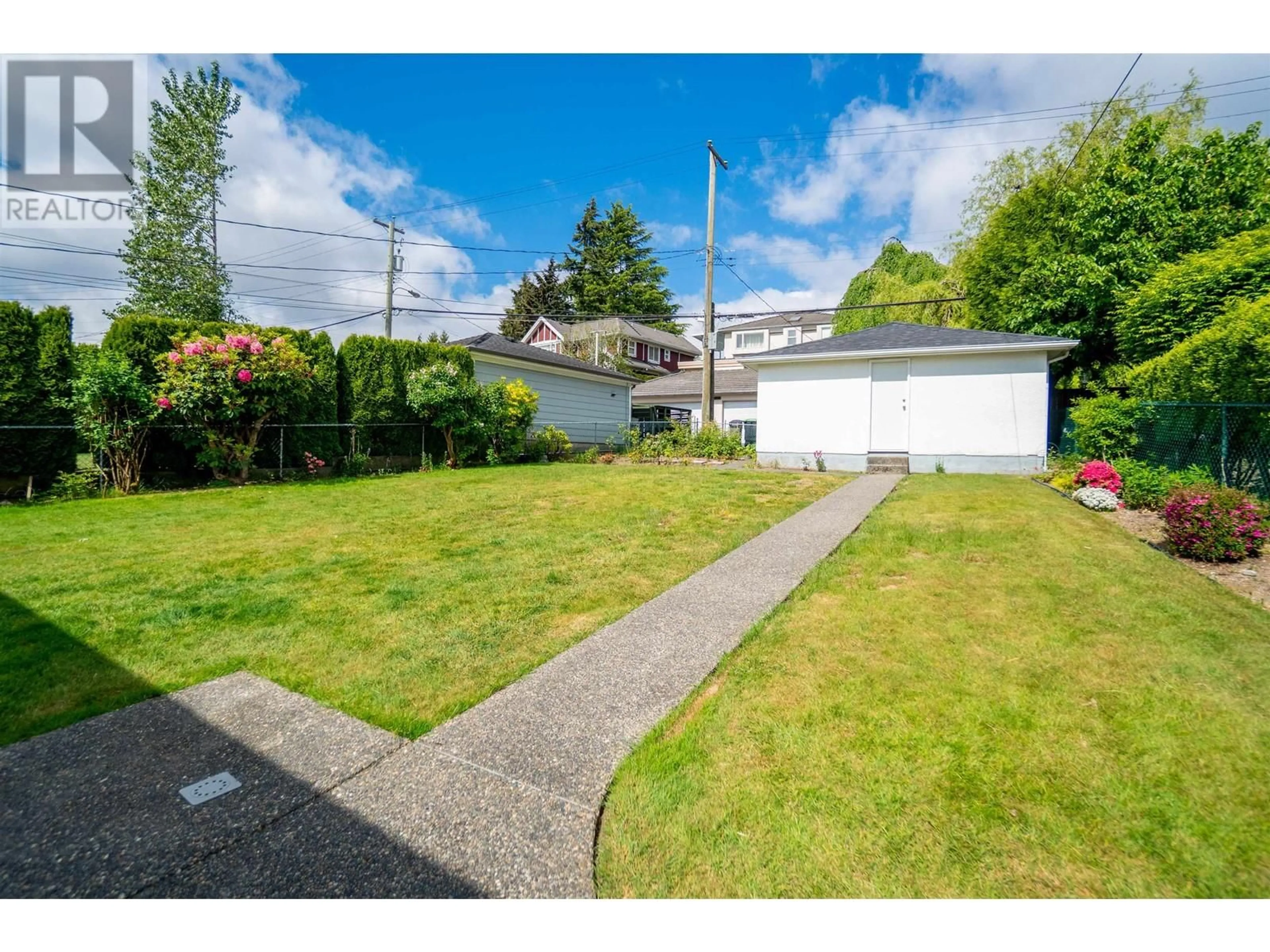 A pic from outside/outdoor area/front of a property/back of a property/a pic from drone, street for 7895 ELLIOTT STREET, Vancouver British Columbia V5S2P1