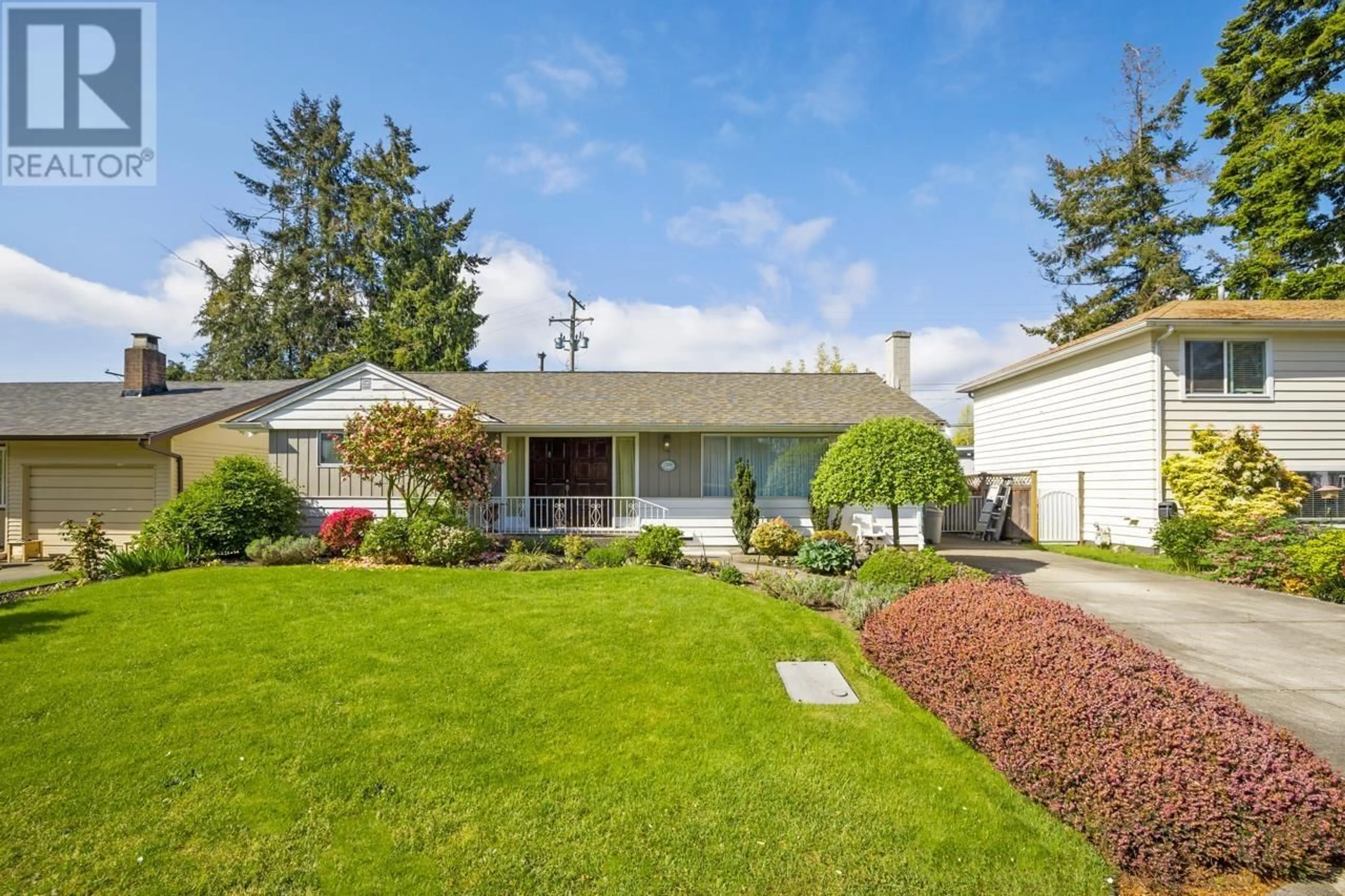 Home with vinyl exterior material, street for 1269 HUNTER ROAD, Delta British Columbia V4L1Y9