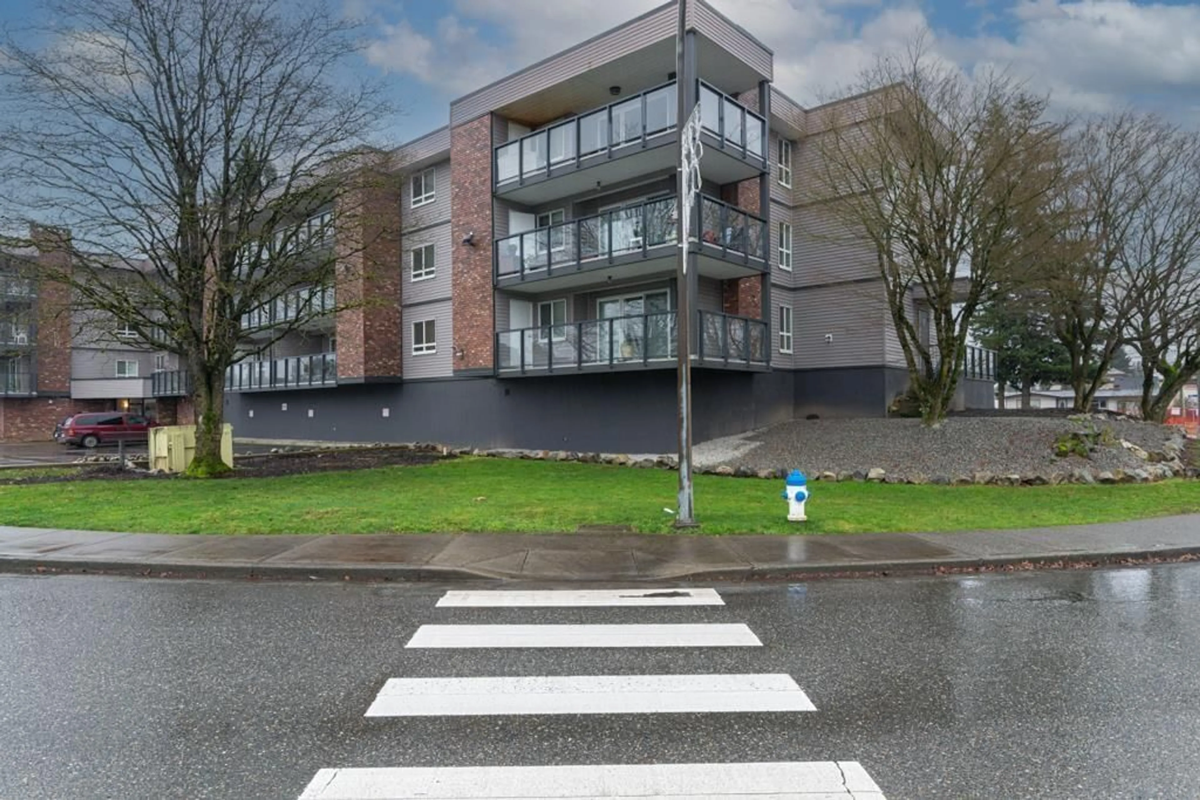 A pic from outside/outdoor area/front of a property/back of a property/a pic from drone, street for 107 - 32040 PEARDONVILLE, Abbotsford British Columbia V2T6N8