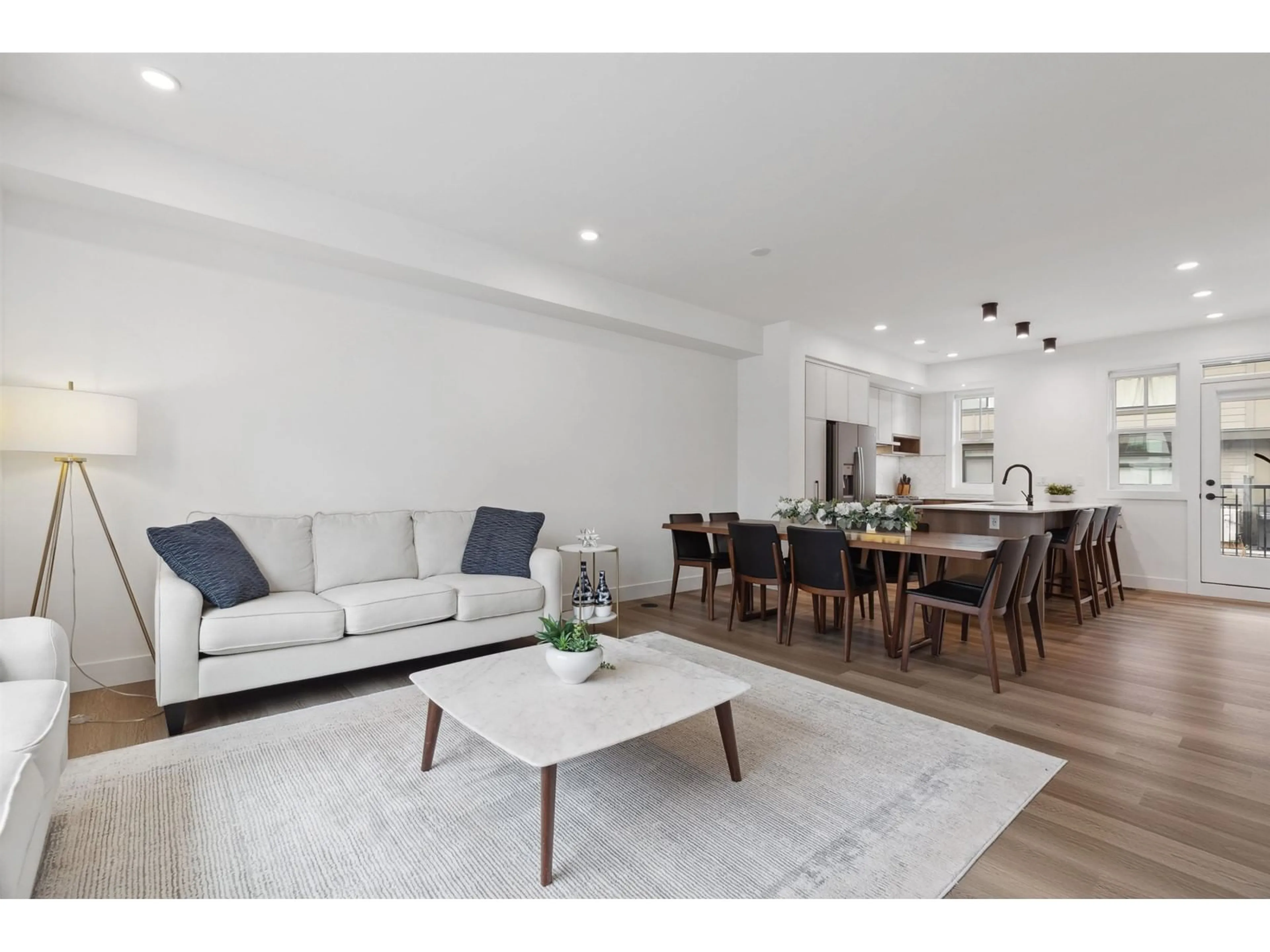 Living room with furniture, wood/laminate floor for 43 - 2350 165, Surrey British Columbia V3Z1J9