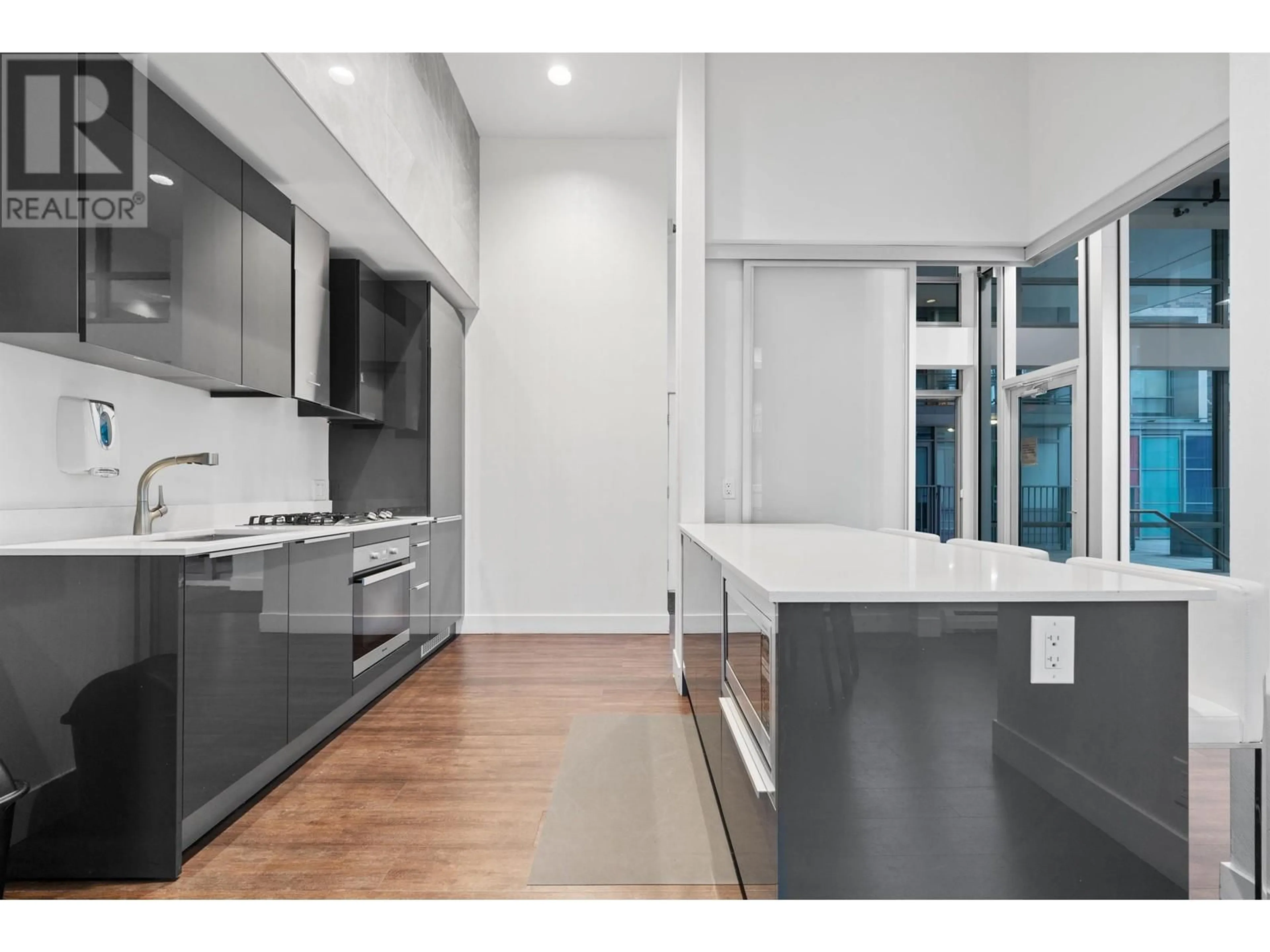 Open concept kitchen, unknown for 404 - 1283 HOWE STREET, Vancouver British Columbia V6Z0E3