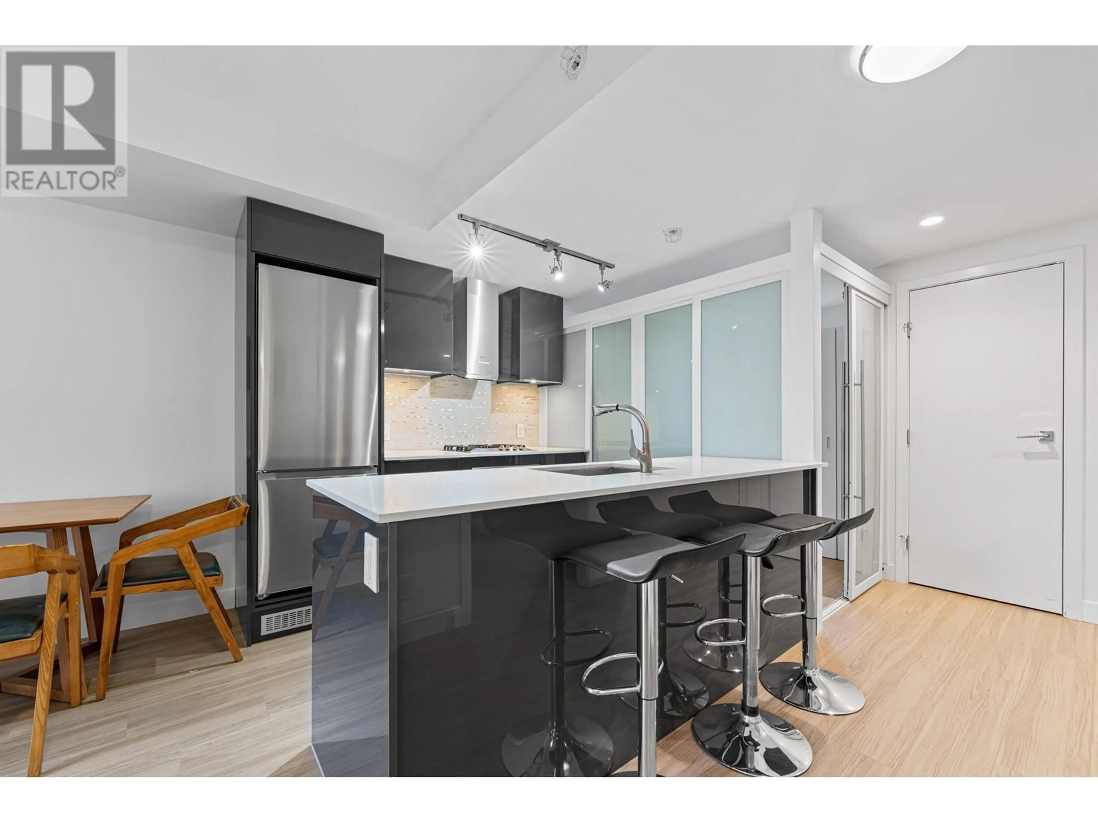 Open concept kitchen, unknown for 404 - 1283 HOWE STREET, Vancouver British Columbia V6Z0E3
