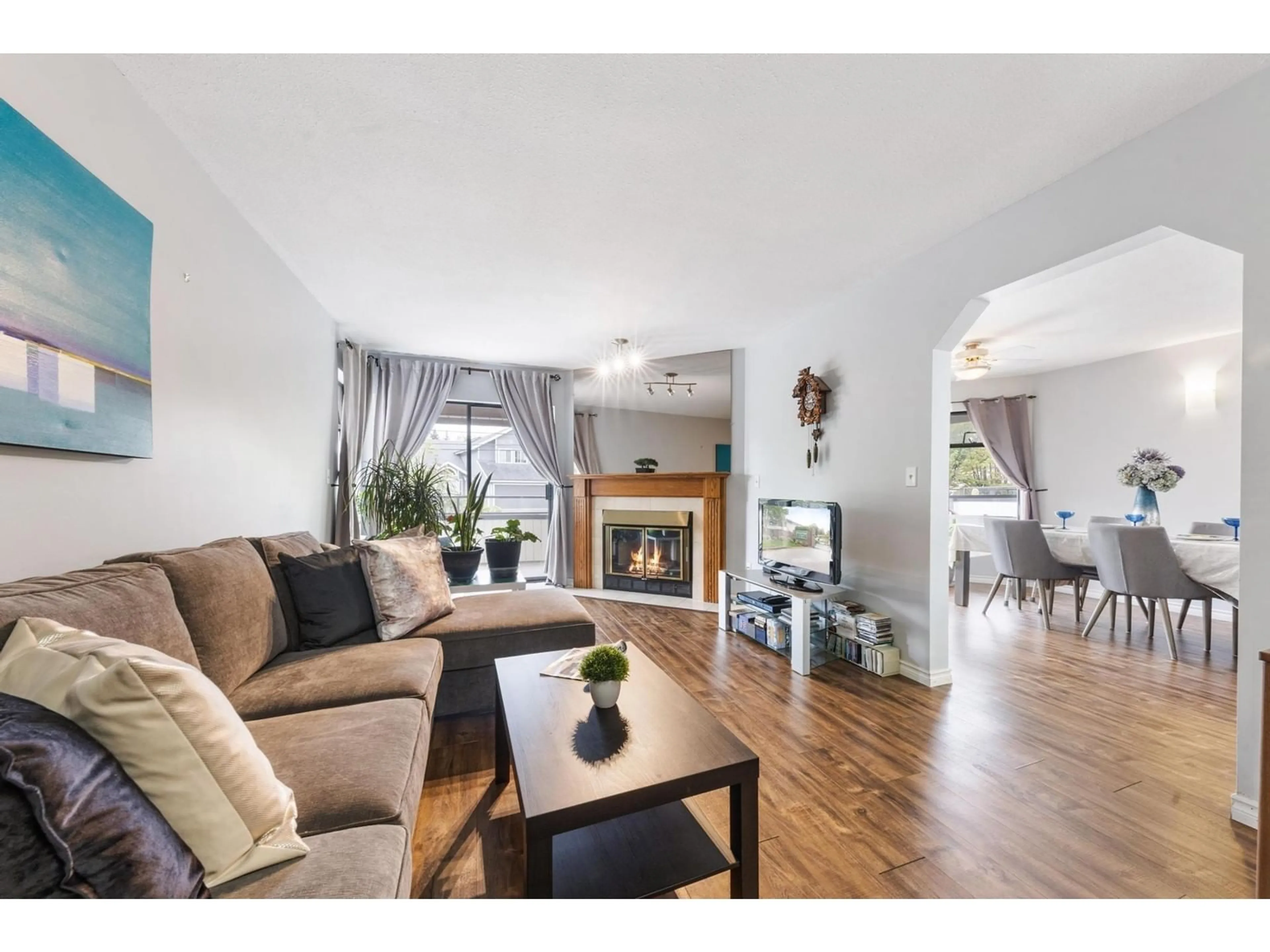Living room with furniture, wood/laminate floor for 236 - 15153 98, Surrey British Columbia V3R9M8