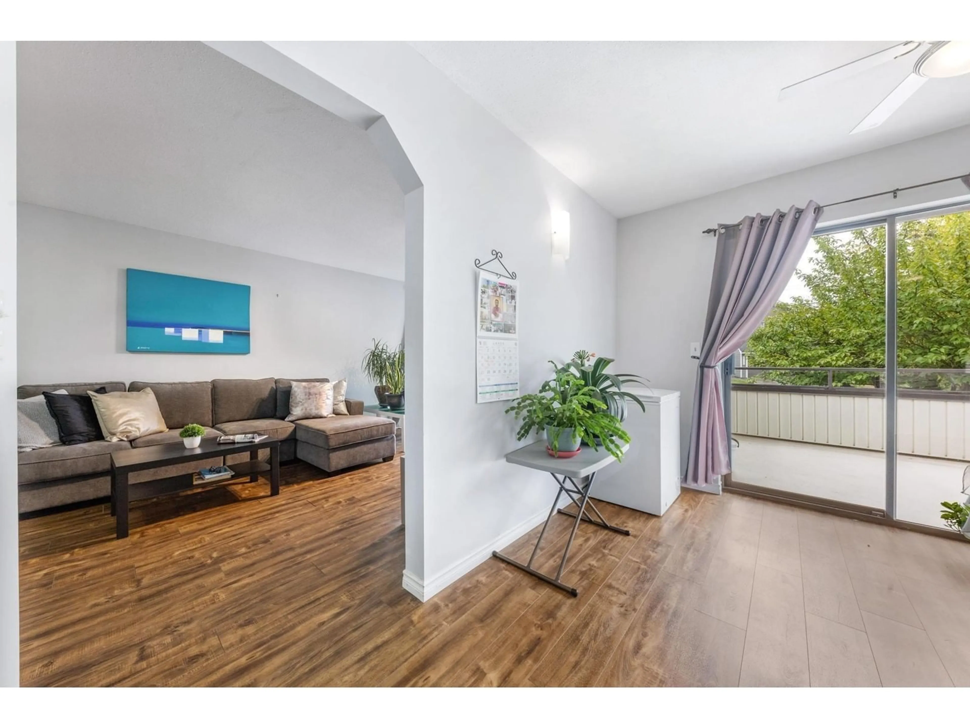 Living room with furniture, wood/laminate floor for 236 - 15153 98, Surrey British Columbia V3R9M8