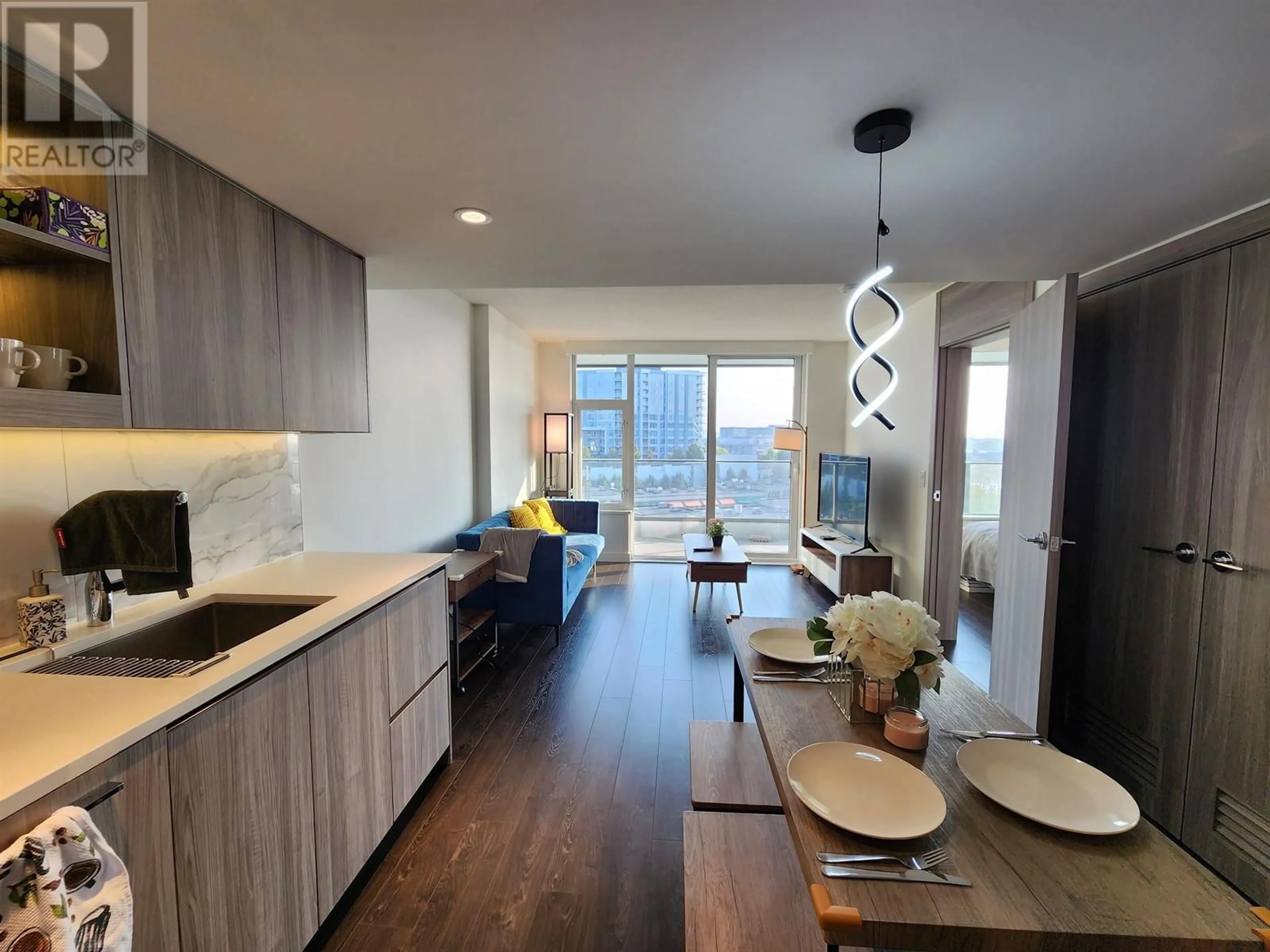 Open concept kitchen, wood/laminate floor for 705 - 8555 CAPSTAN WAY, Richmond British Columbia V6X0W1