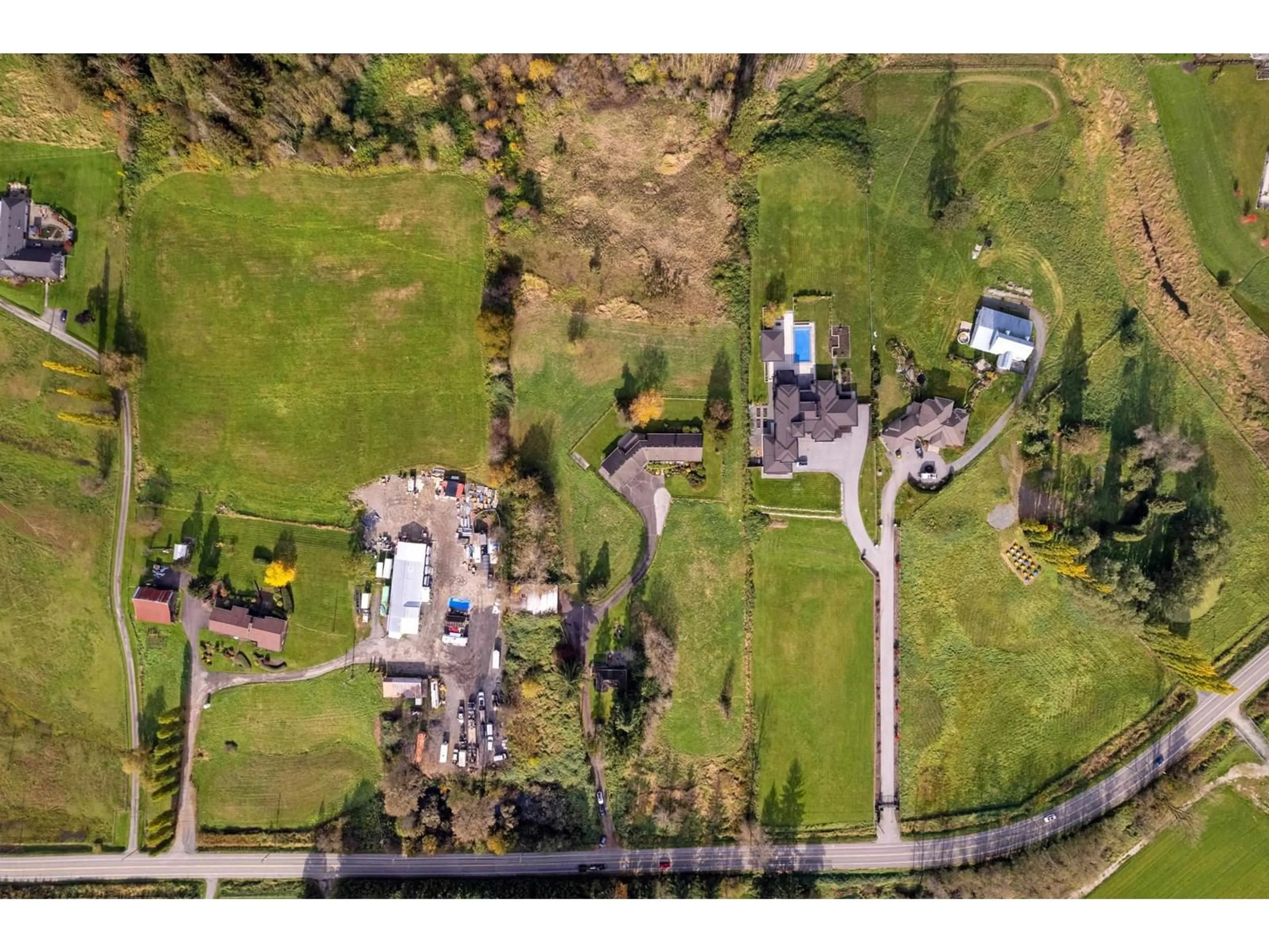 A pic from outside/outdoor area/front of a property/back of a property/a pic from drone, unknown for 22383 96, Langley British Columbia V1M3T6