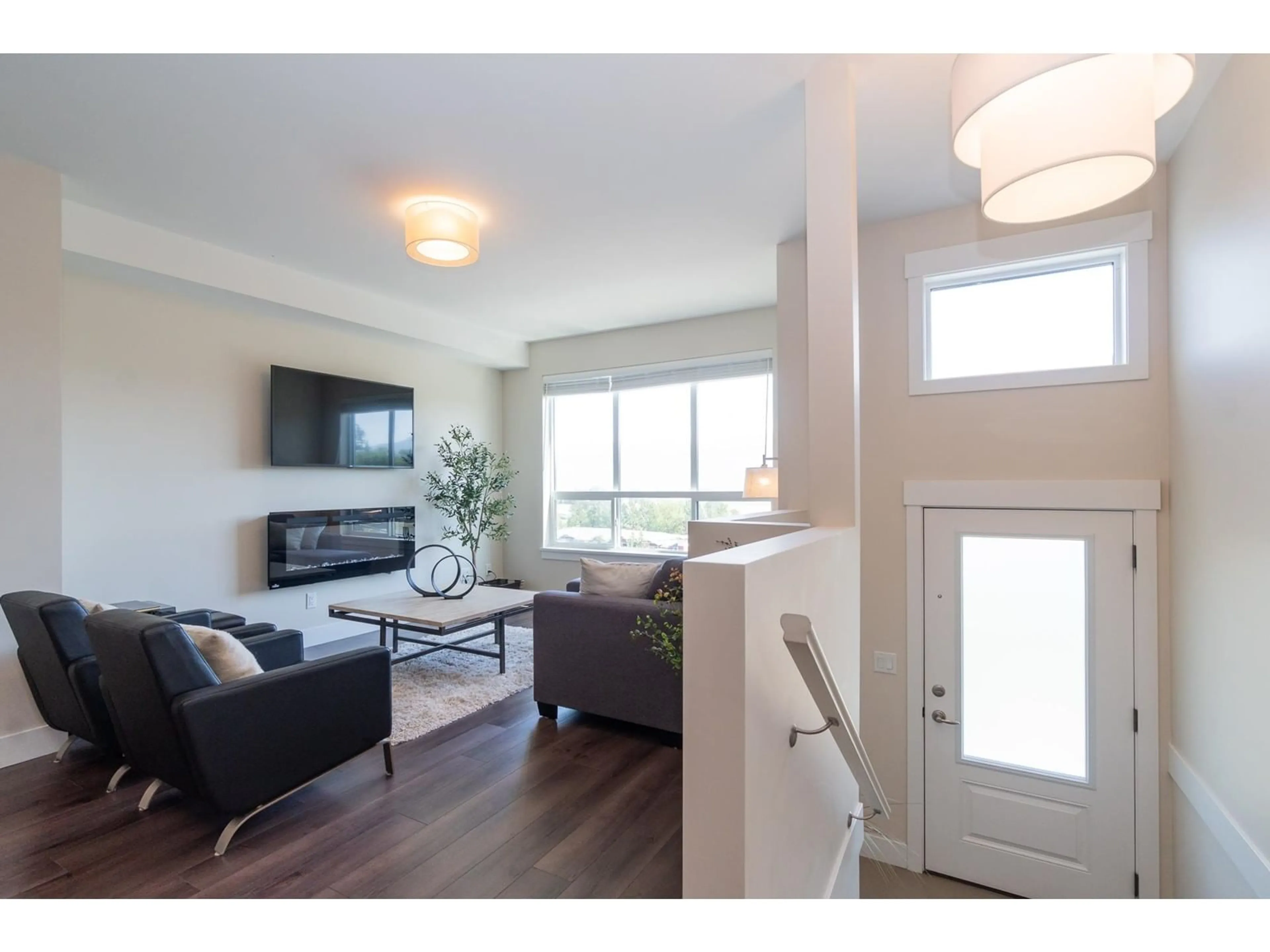 Living room with furniture, wood/laminate floor for 10 - 36099 WATERLEAF, Abbotsford British Columbia V3G0G5