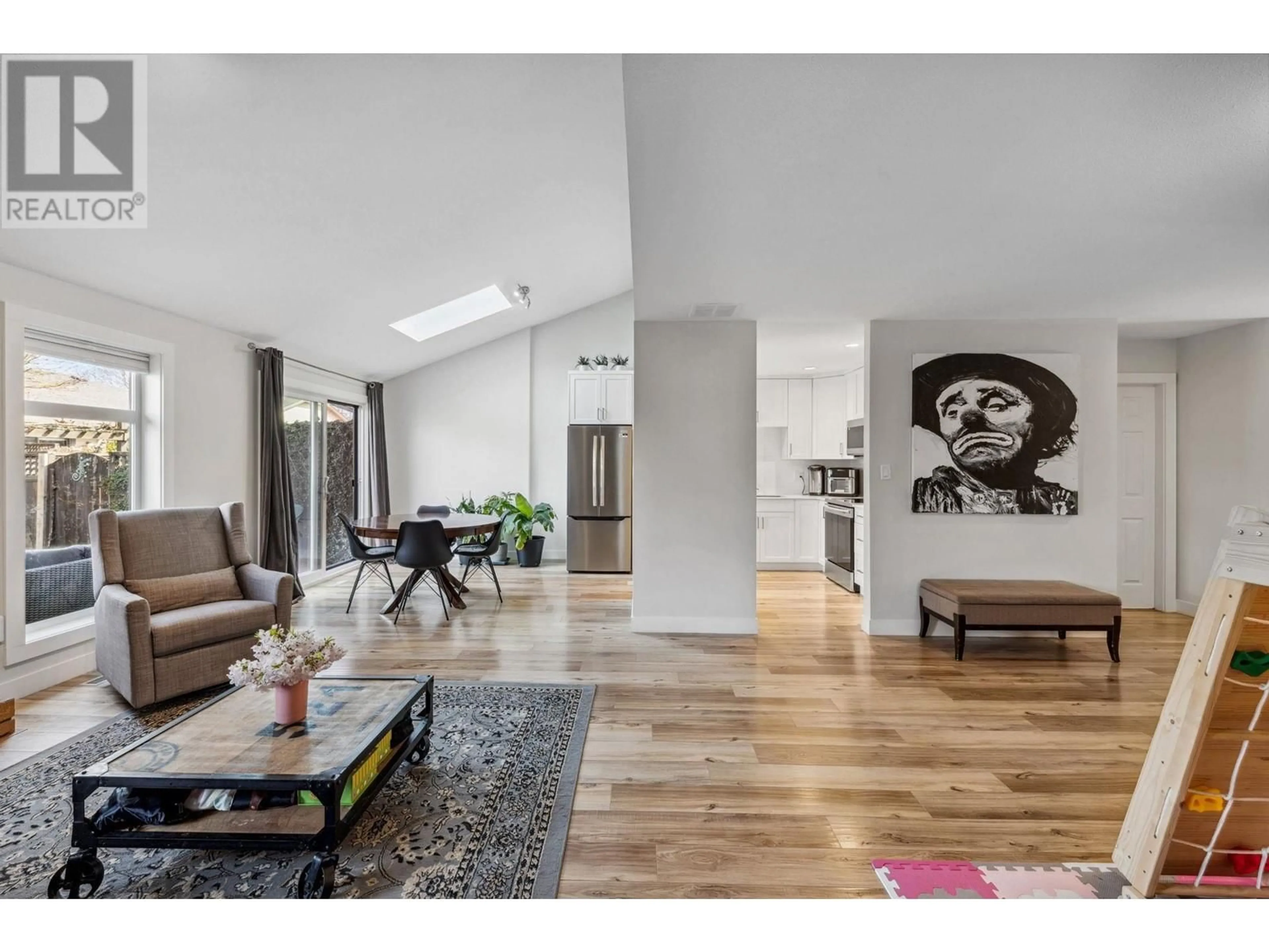 Living room with furniture, wood/laminate floor for 10 - 10177 PUGWASH PLACE, Richmond British Columbia V7E5N9