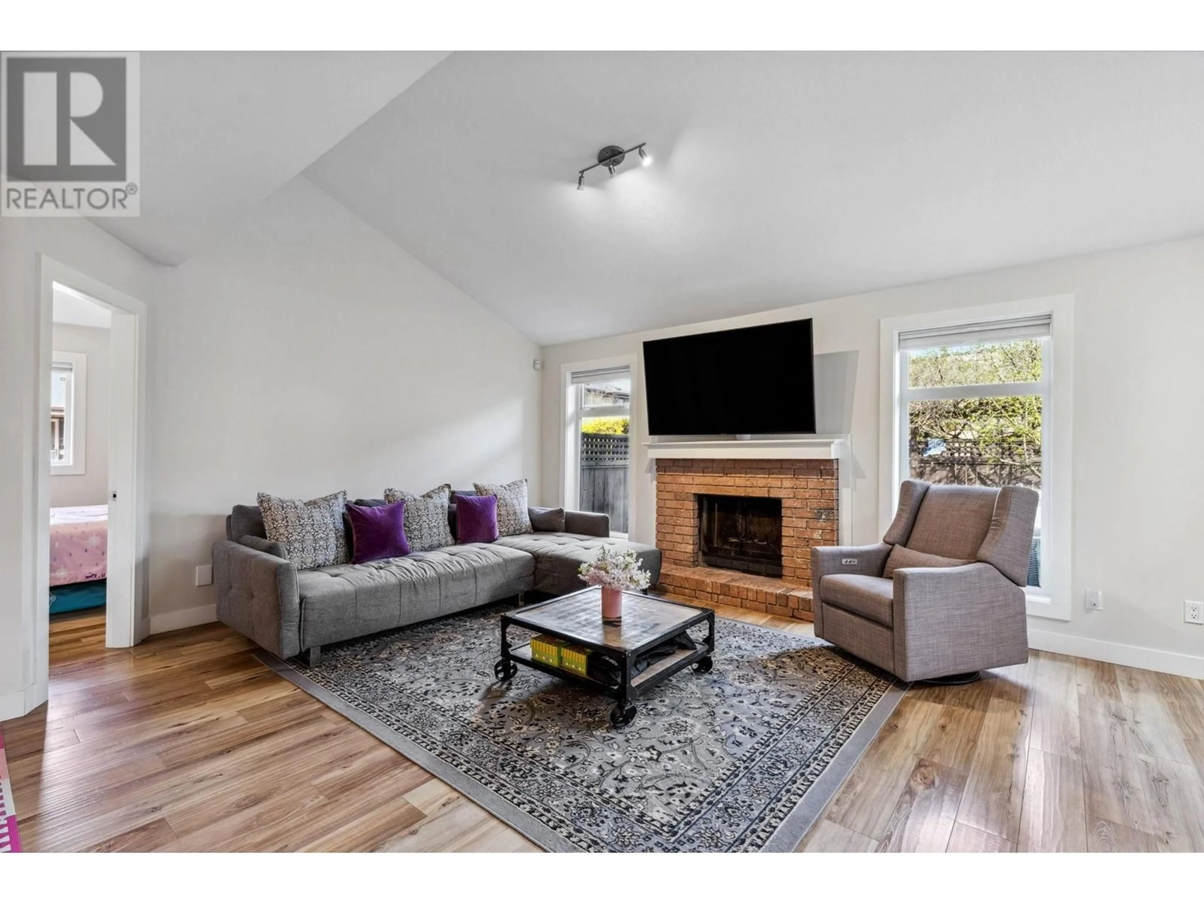 Living room with furniture, wood/laminate floor for 10 - 10177 PUGWASH PLACE, Richmond British Columbia V7E5N9