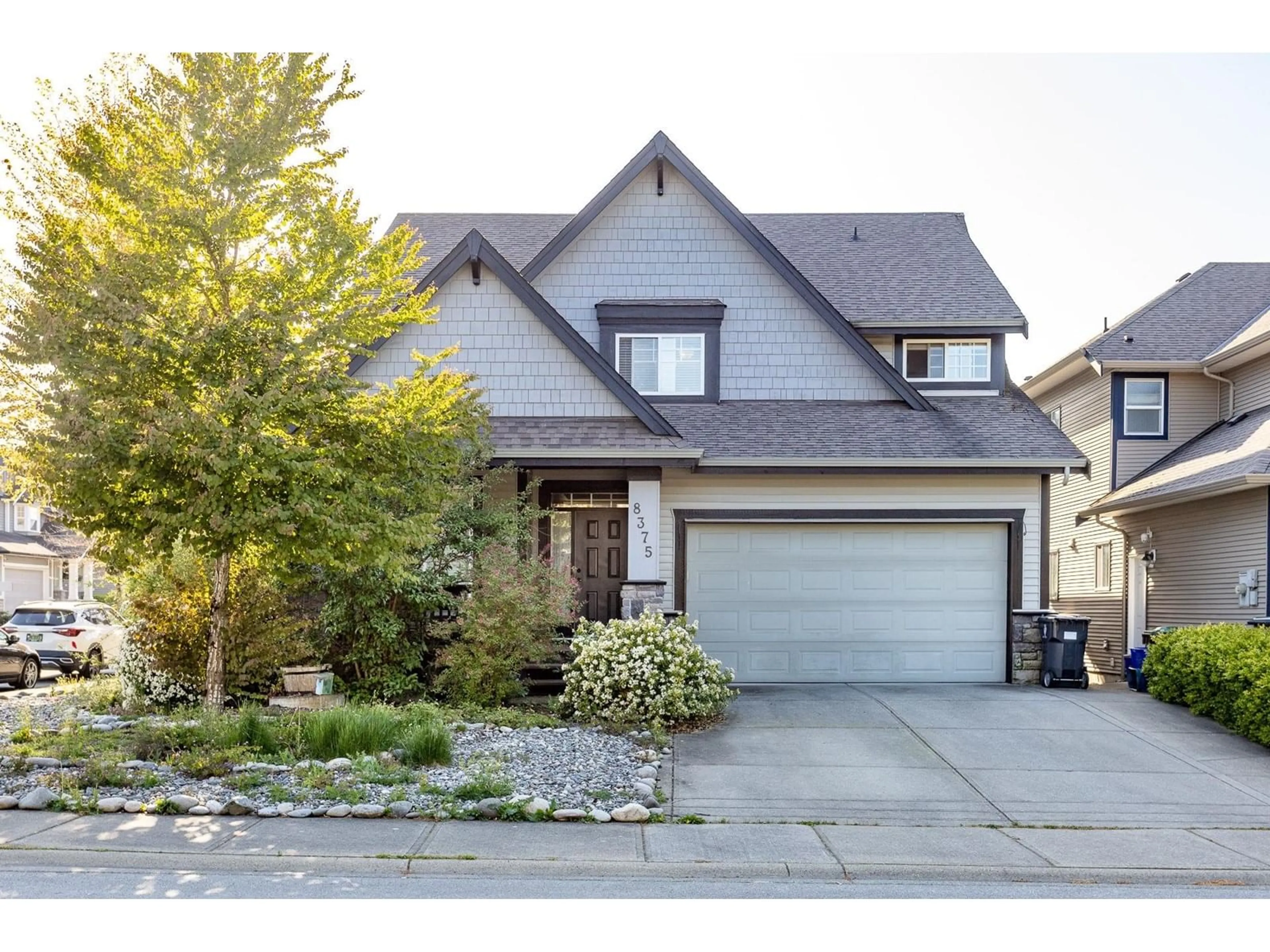 Home with vinyl exterior material, street for 8375 209, Langley British Columbia V2Y0A3