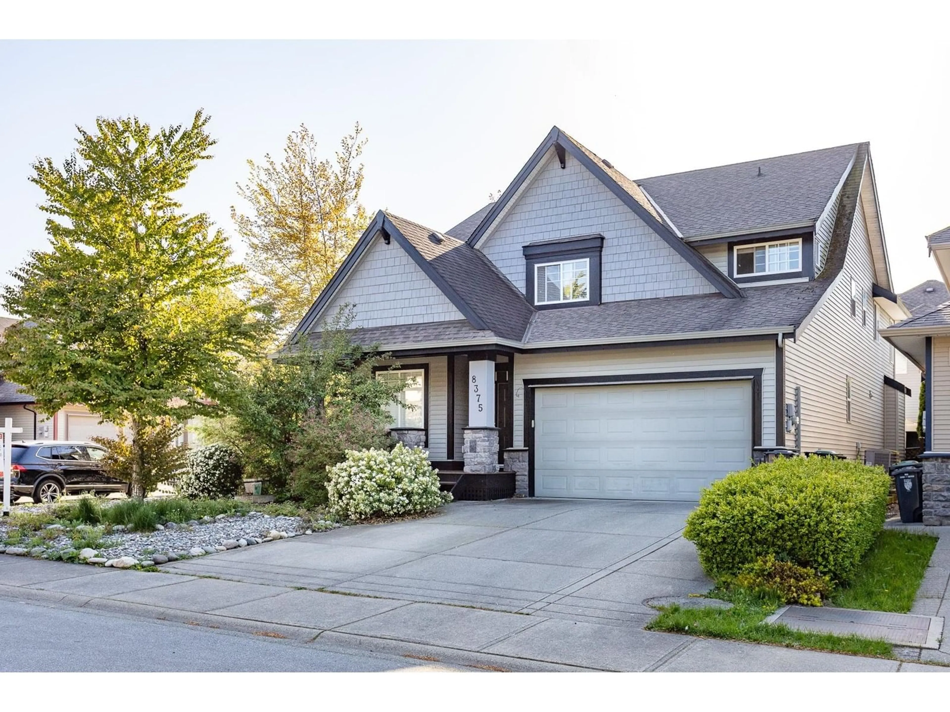 Home with vinyl exterior material, street for 8375 209, Langley British Columbia V2Y0A3