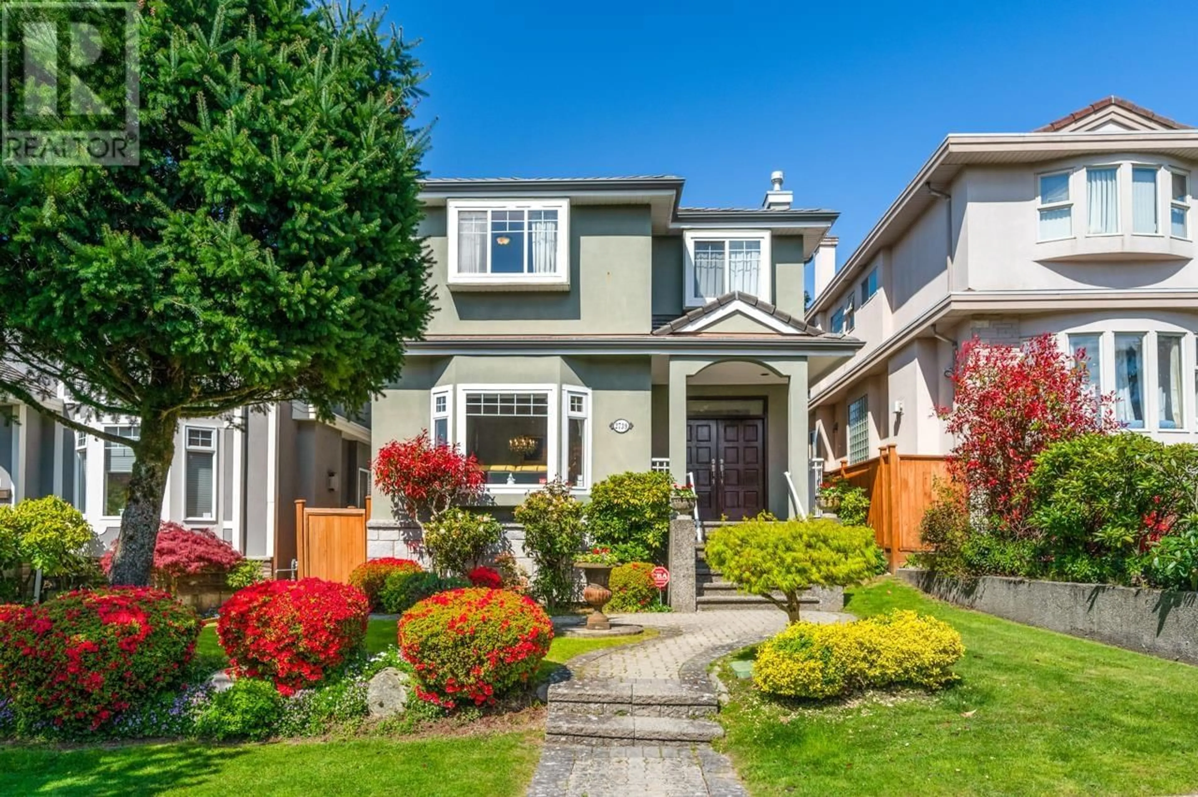 Home with vinyl exterior material, street for 2739 32ND AVENUE, Vancouver British Columbia V6L2B4
