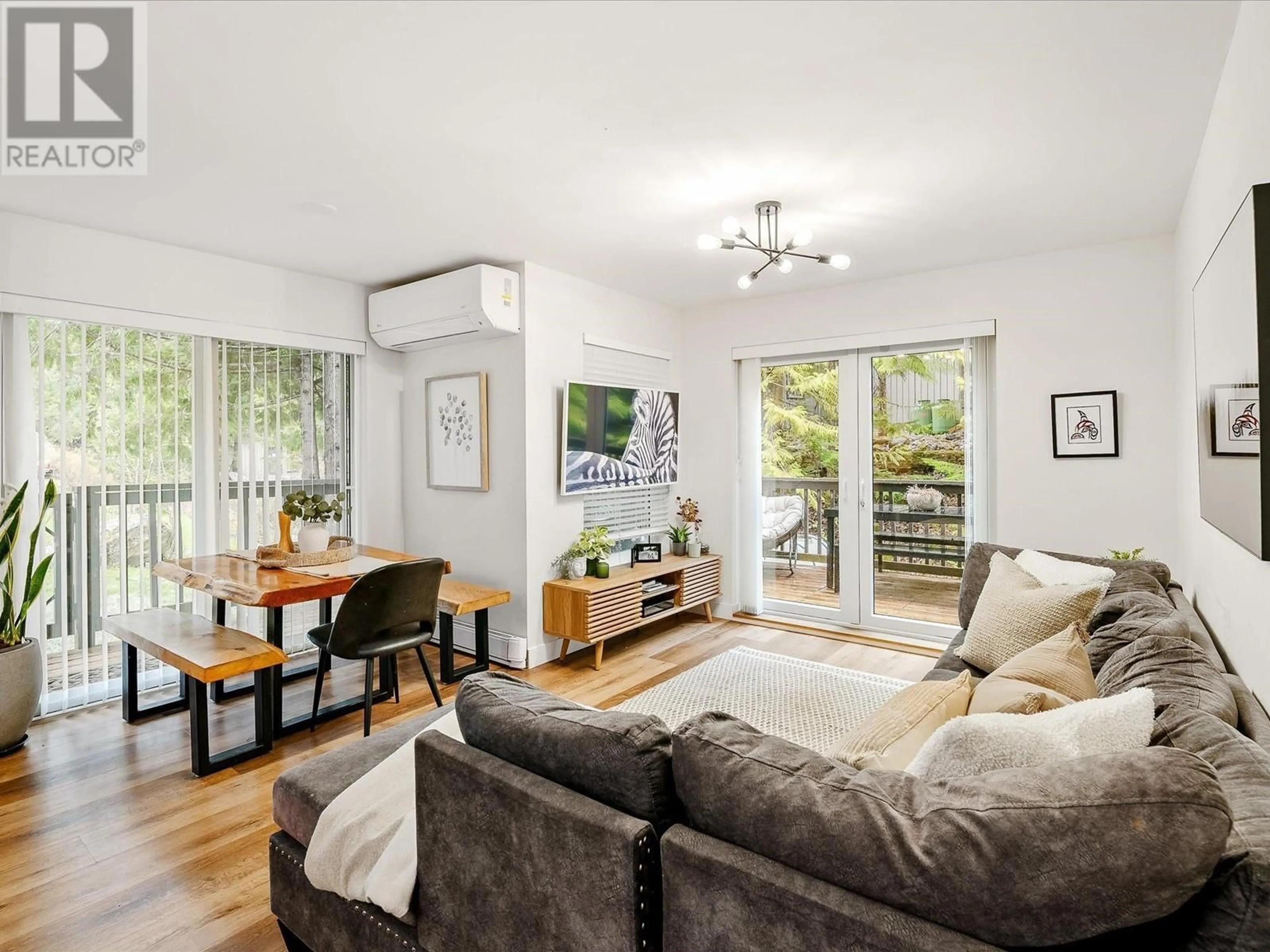 Living room with furniture, wood/laminate floor for 1A - 2230 EVA LAKE ROAD, Whistler British Columbia V8E0M5
