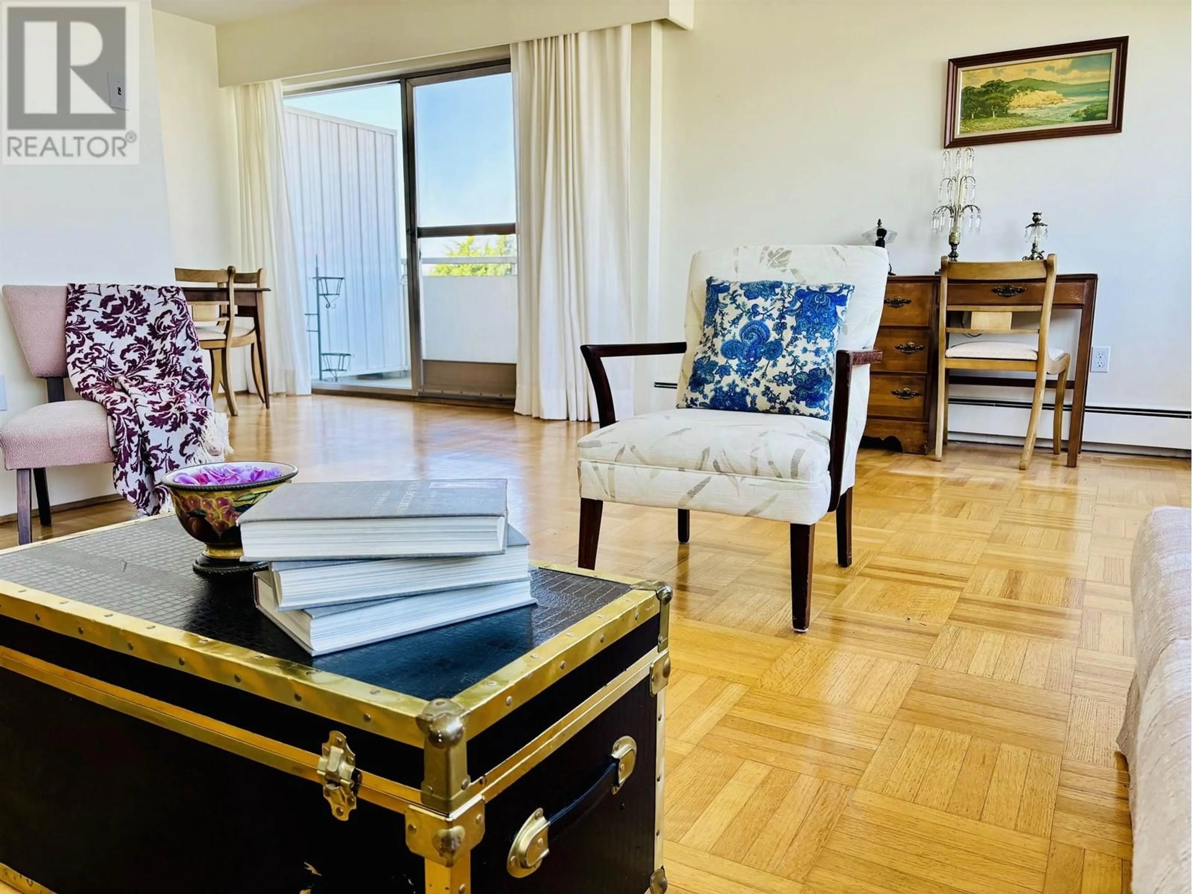 Living room with furniture, wood/laminate floor for 604 - 5926 TISDALL STREET, Vancouver British Columbia V5Z3N2