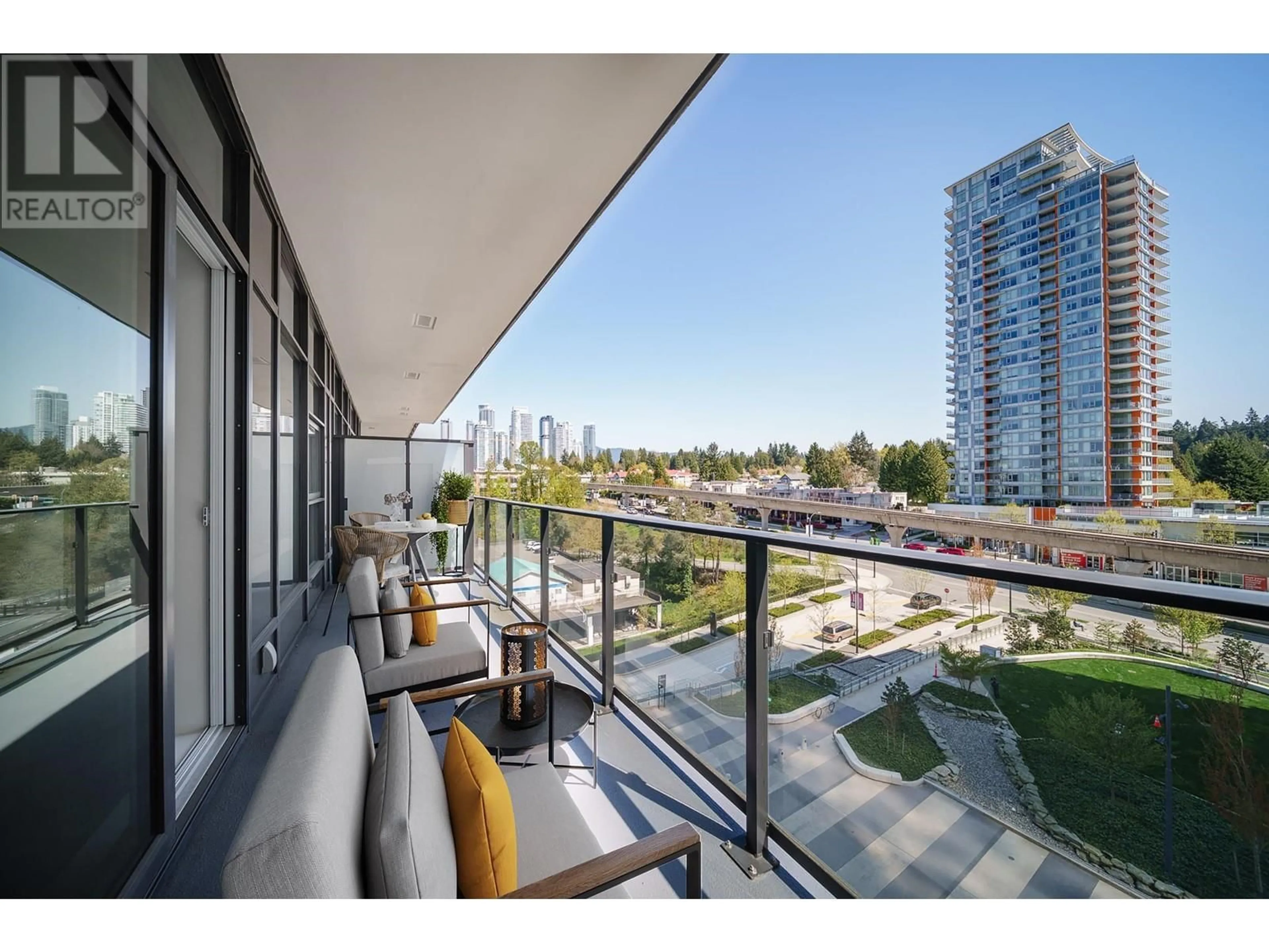 Patio, city buildings view from balcony for 603 - 3809 EVERGREEN PLACE, Burnaby British Columbia V3J0M1