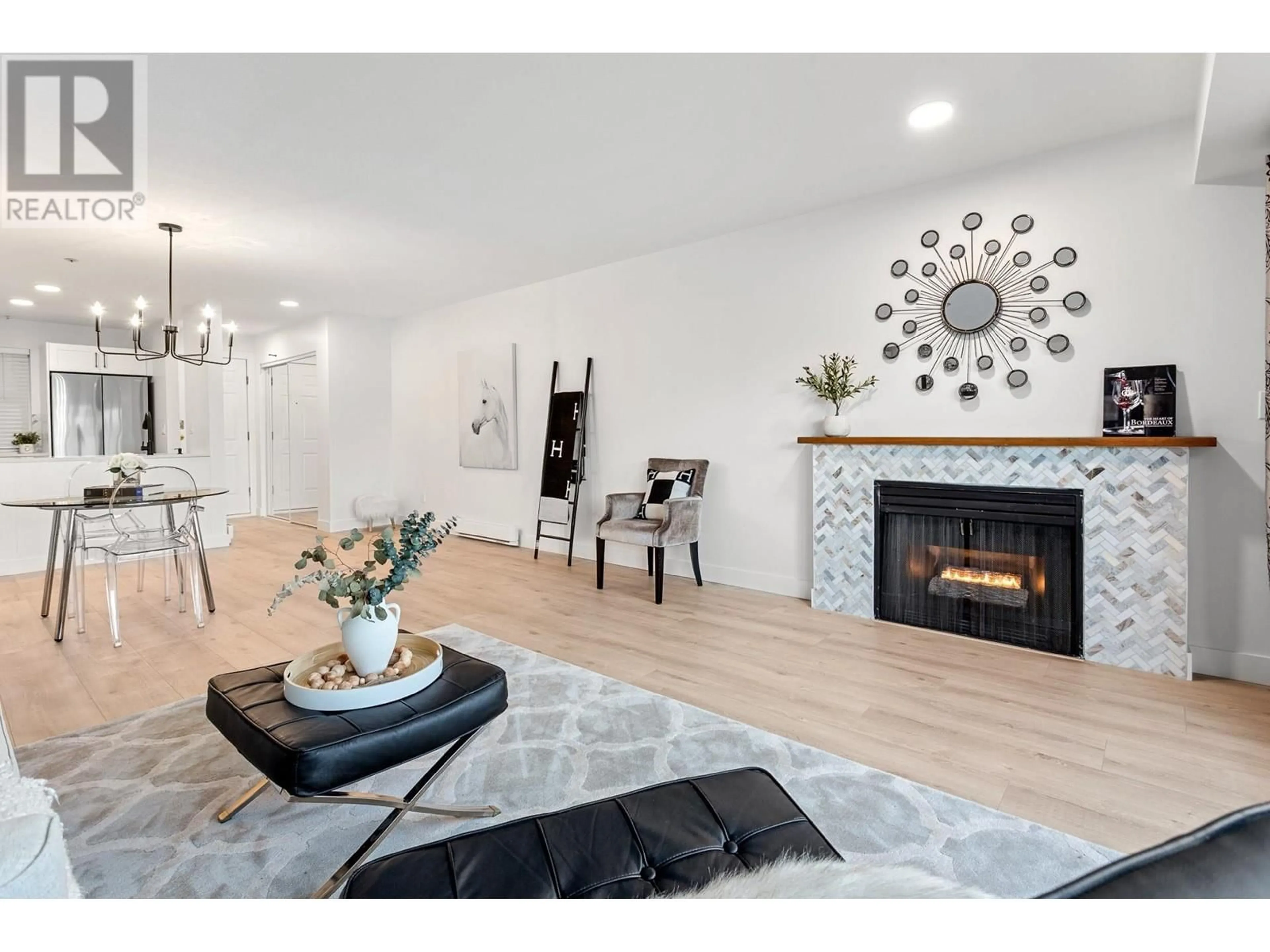 Living room with furniture, unknown for 203 - 1570 PRAIRIE AVENUE, Port Coquitlam British Columbia V3B1T4