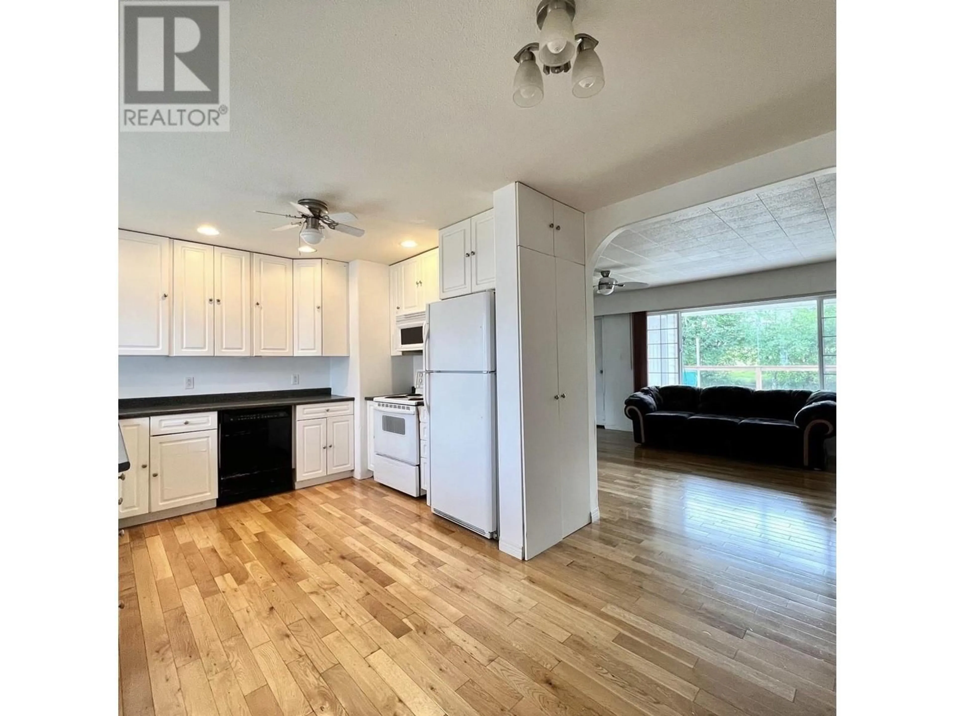 Open concept kitchen, wood/laminate floor for 53 WREN STREET, Kitimat British Columbia V8C1L2