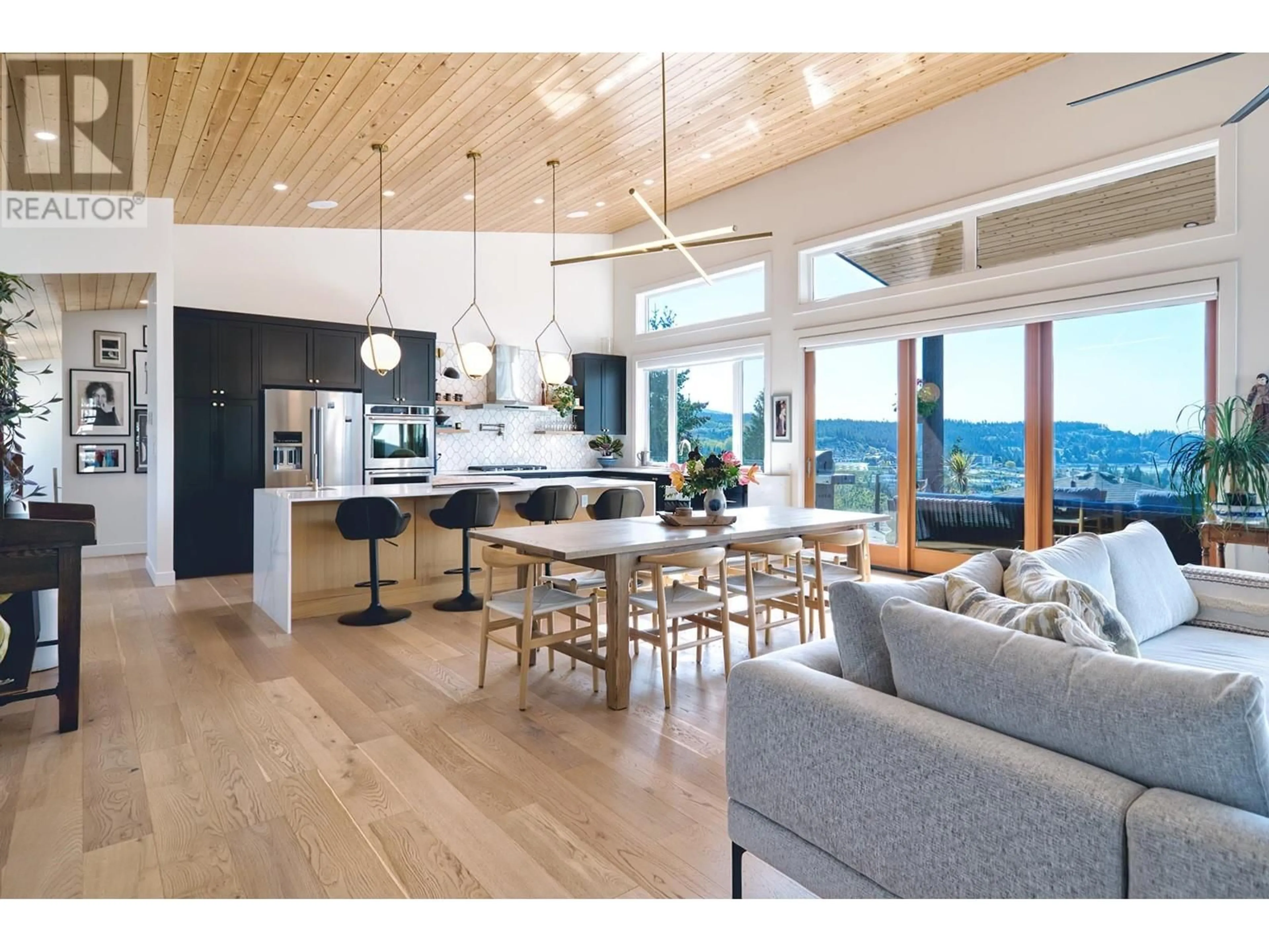 Open concept kitchen, wood/laminate floor for 5769 GENNI'S WAY, Sechelt British Columbia V7Z0N8