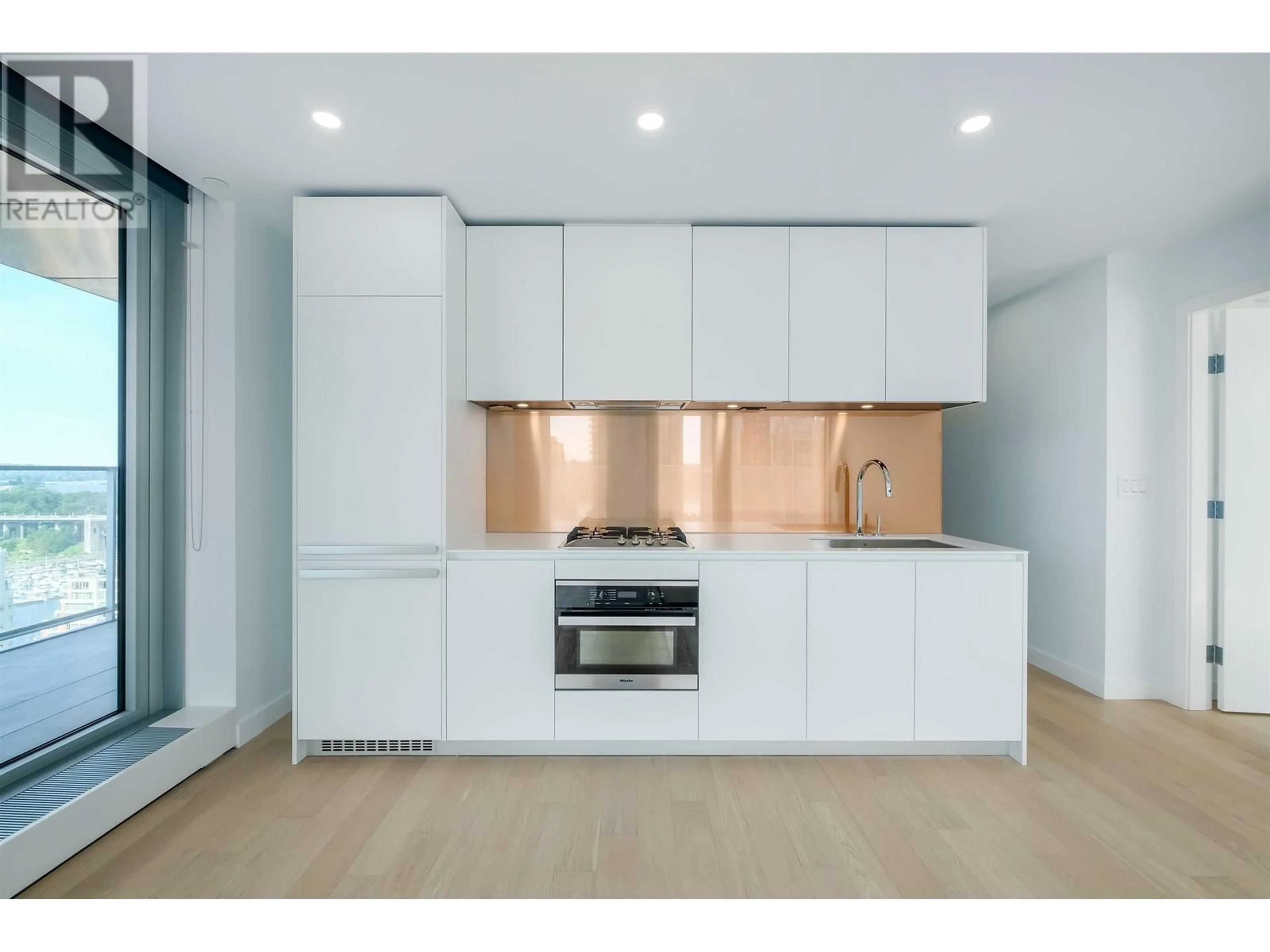 Open concept kitchen, wood/laminate floor for 2102 - 1480 HOWE STREET, Vancouver British Columbia V6Z1C4