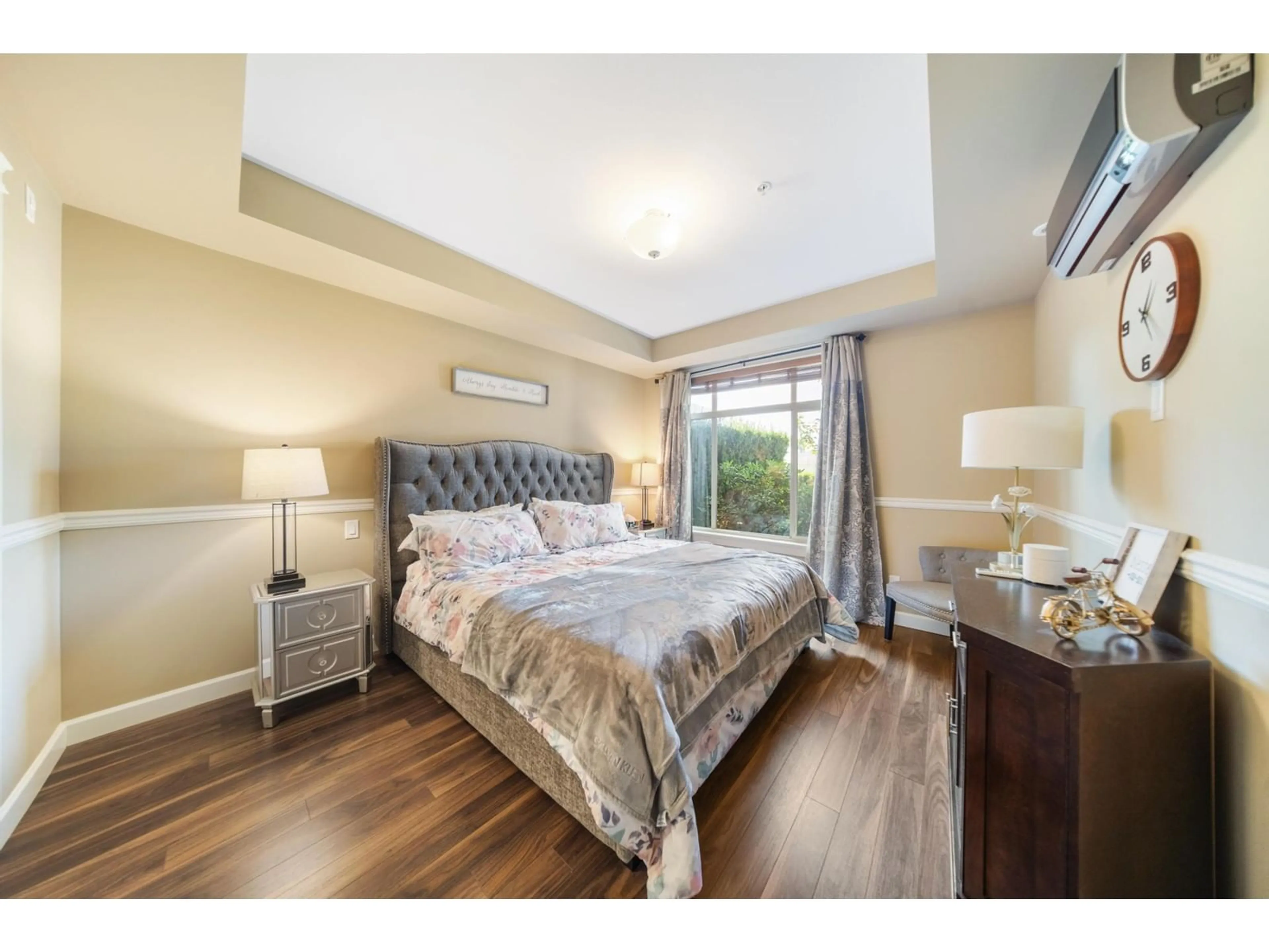 Bedroom with bed, wood/laminate floor for 104 - 2860 TRETHEWEY, Abbotsford British Columbia V2T0G5