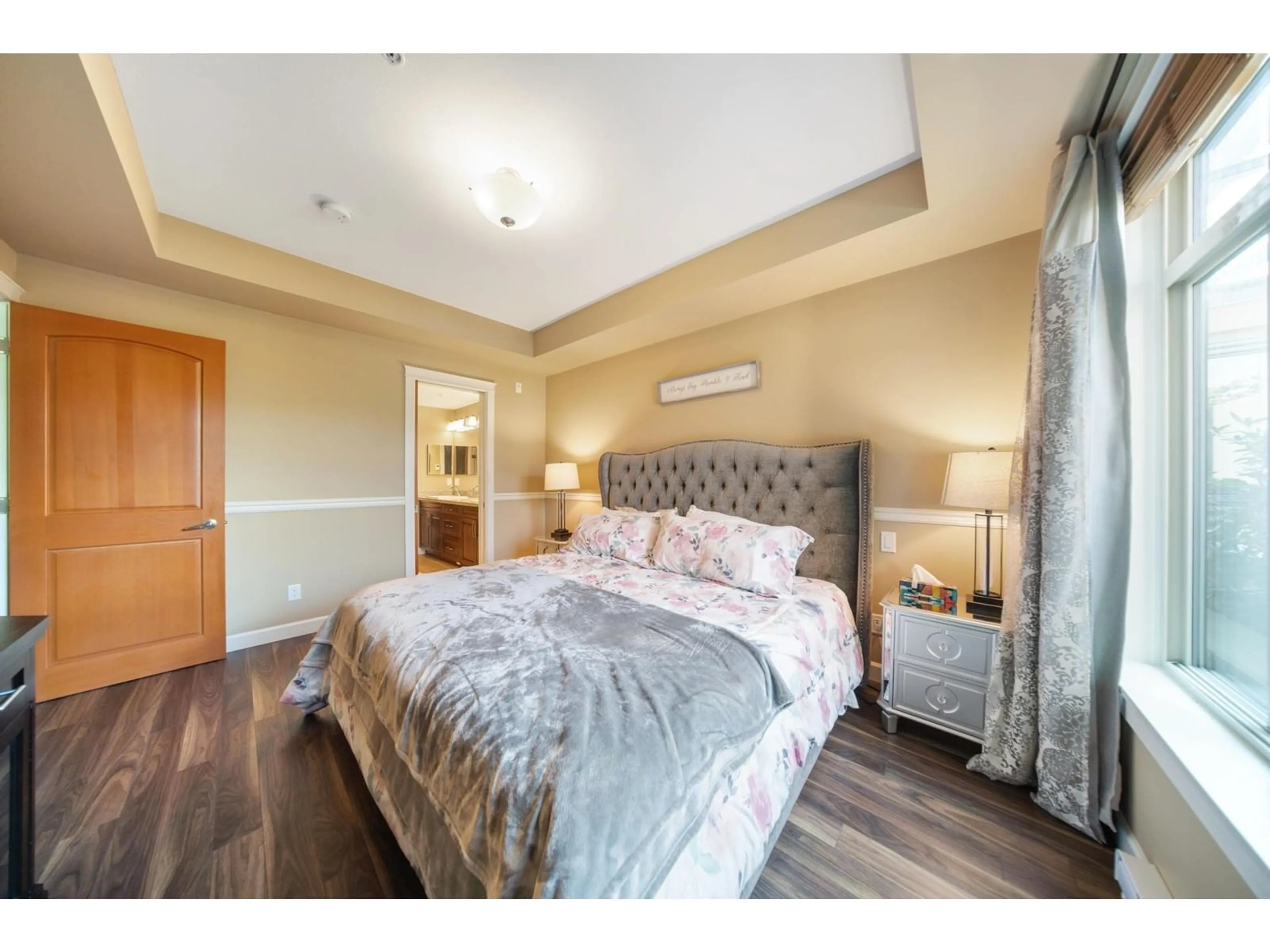Bedroom with bed, wood/laminate floor for 104 - 2860 TRETHEWEY, Abbotsford British Columbia V2T0G5