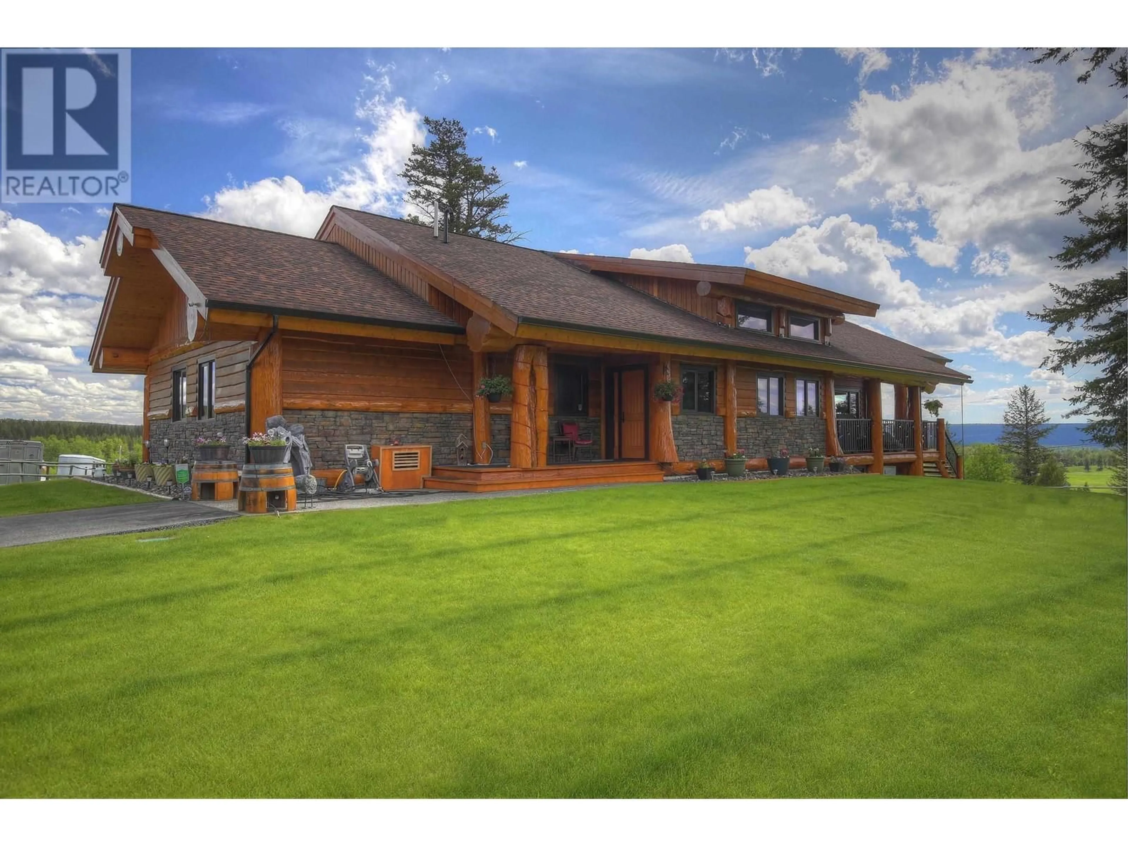 A pic from outside/outdoor area/front of a property/back of a property/a pic from drone, unknown for 3139 HUSTON ROAD, 150 Mile House British Columbia V0K2G0