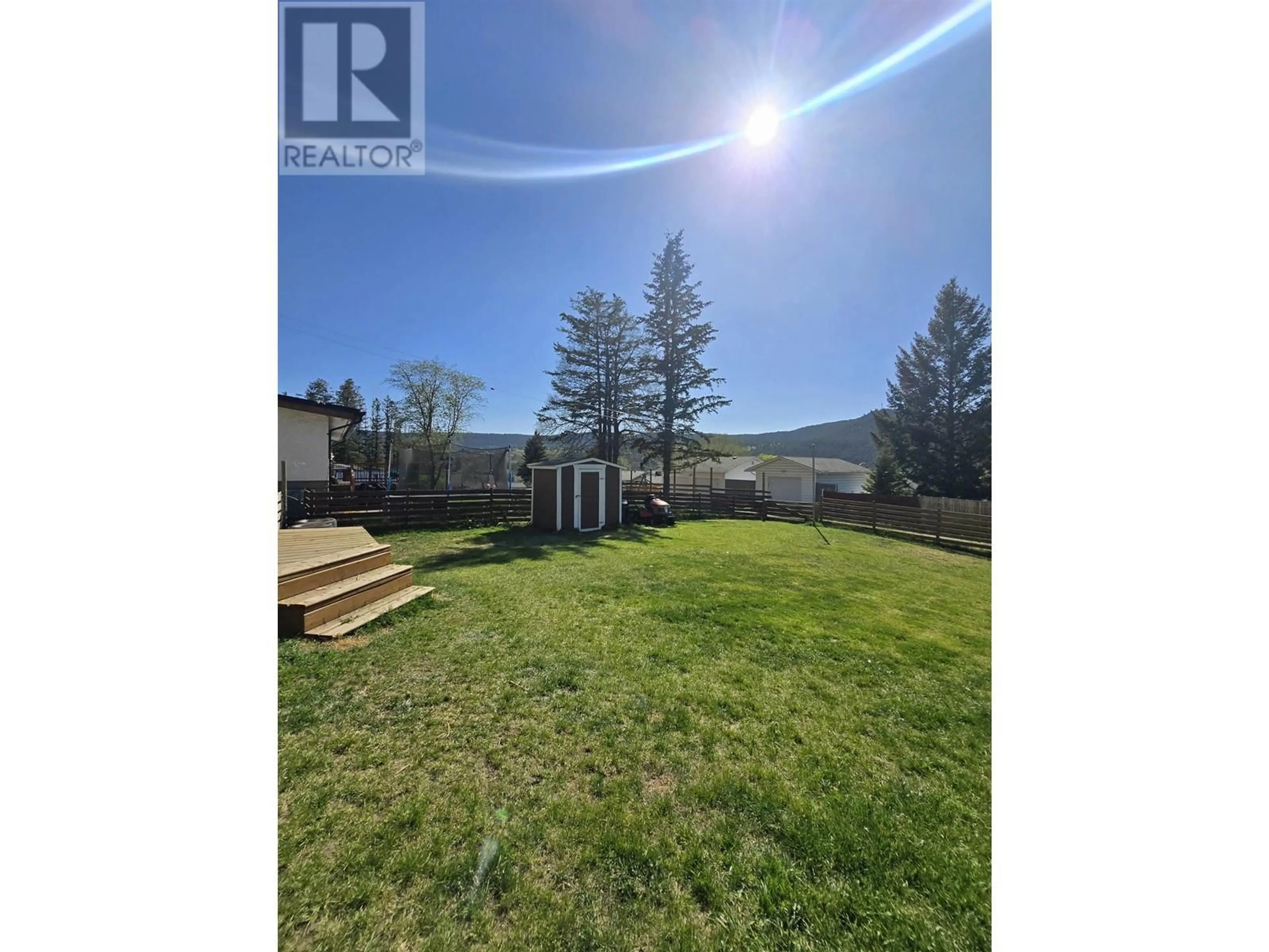 A pic from outside/outdoor area/front of a property/back of a property/a pic from drone, water/lake/river/ocean view for 725 PIGEON AVENUE, Williams Lake British Columbia V2G2B4