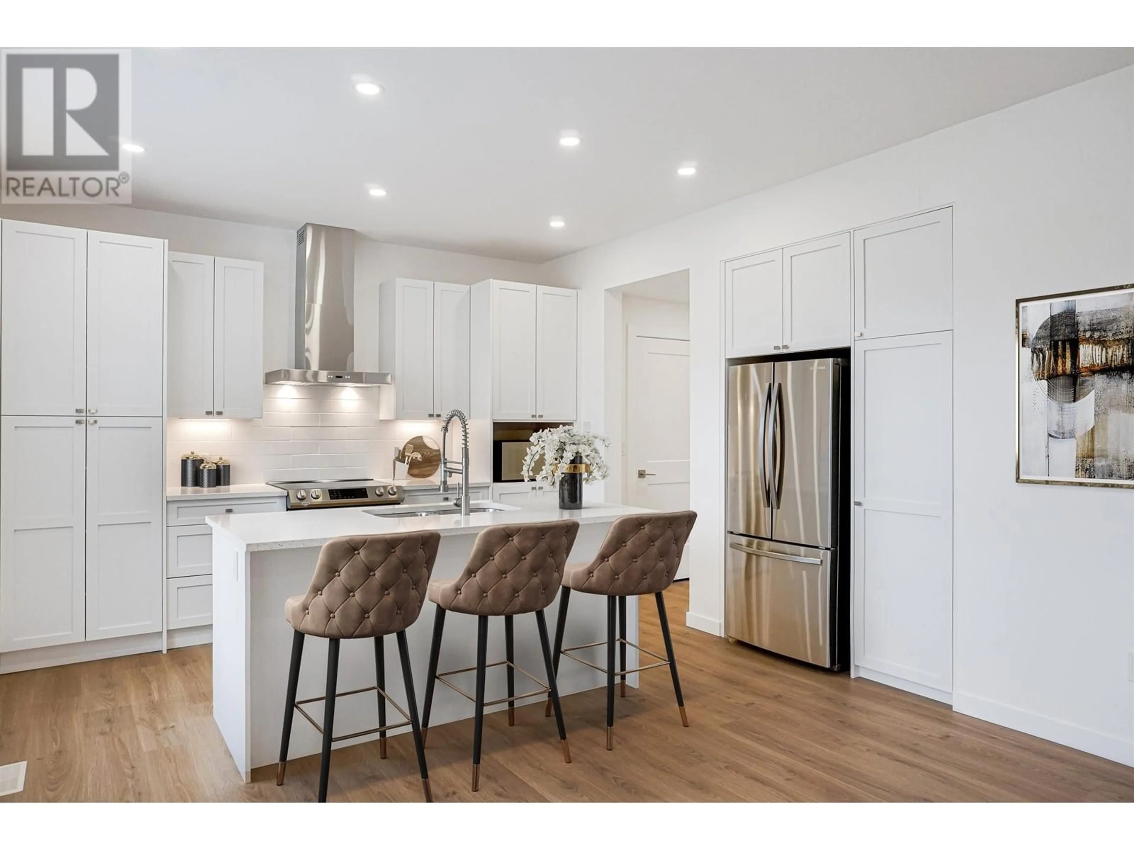 Open concept kitchen, wood/laminate floor for 64 WOZNEY STREET, Kitimat British Columbia V8C2S2