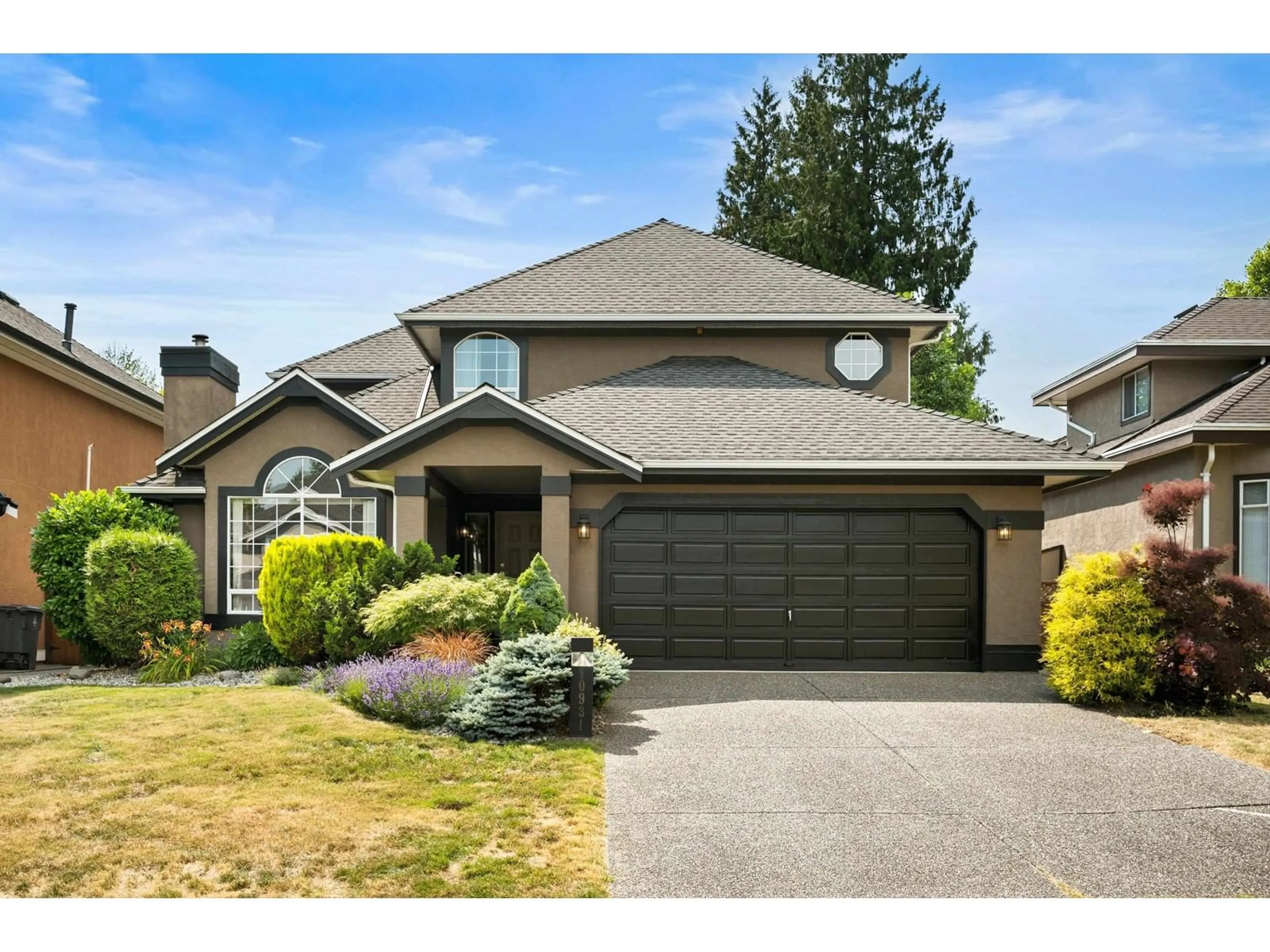 Home with vinyl exterior material, street for 10931 161A, Surrey British Columbia V4N3J7