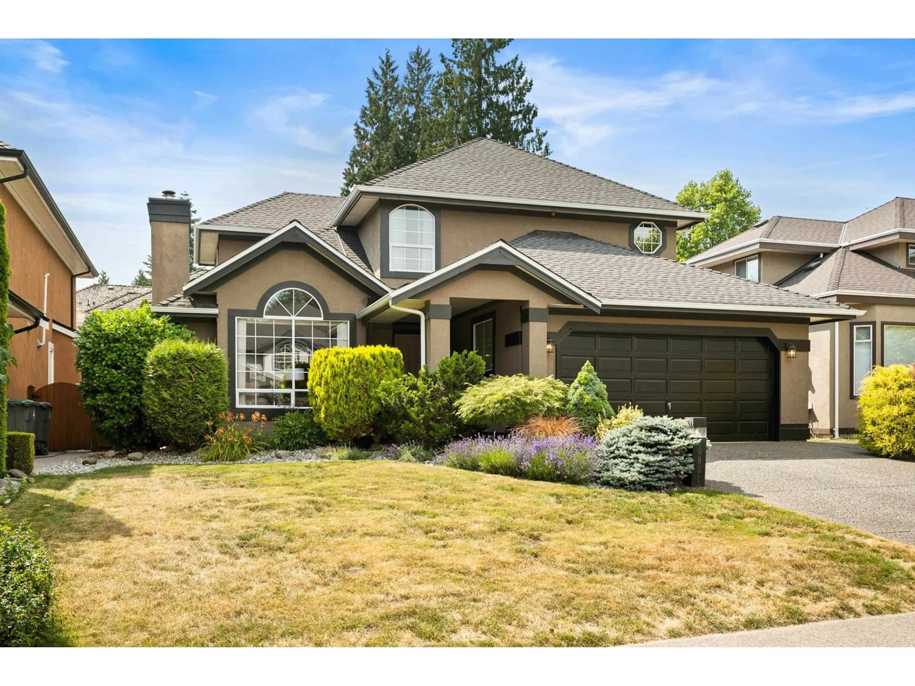 Home with vinyl exterior material, street for 10931 161A, Surrey British Columbia V4N3J7