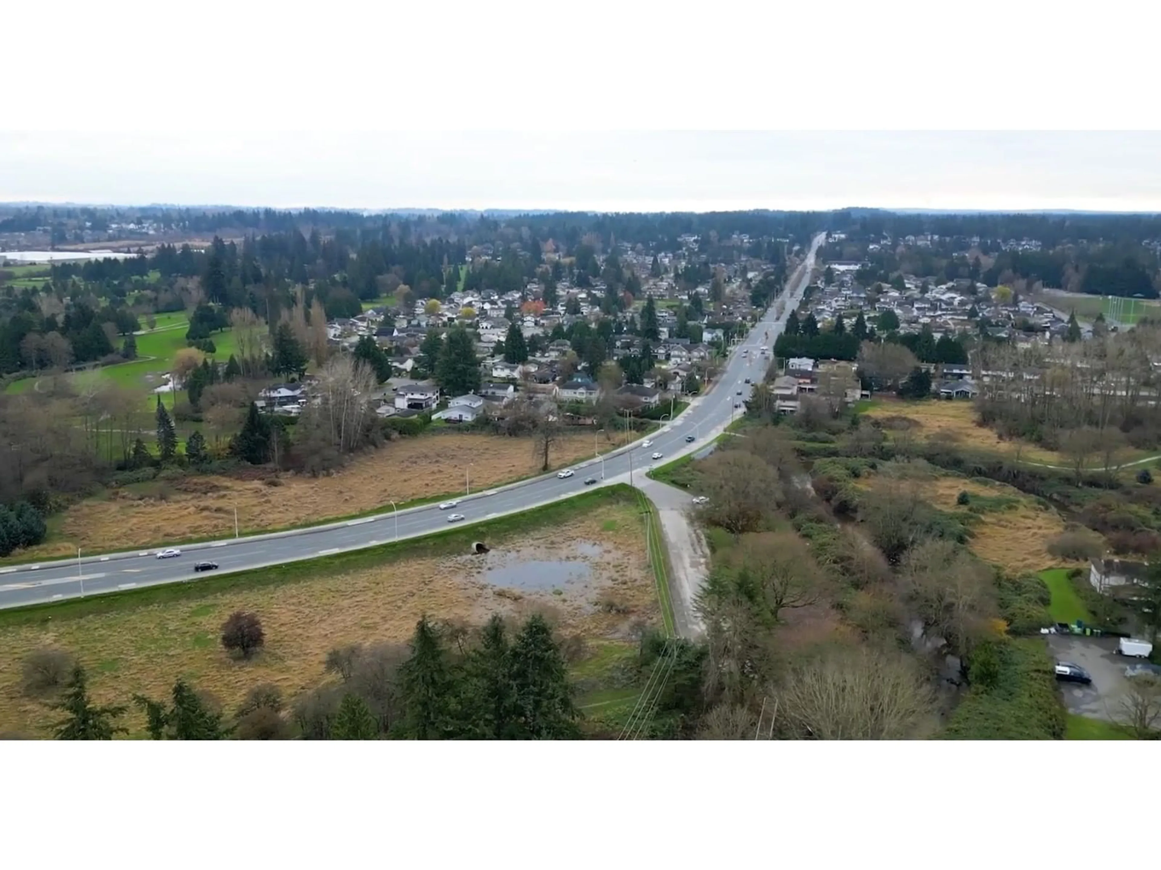 A pic from outside/outdoor area/front of a property/back of a property/a pic from drone, mountain view for 401 - 5420 208, Langley British Columbia V3A2J9