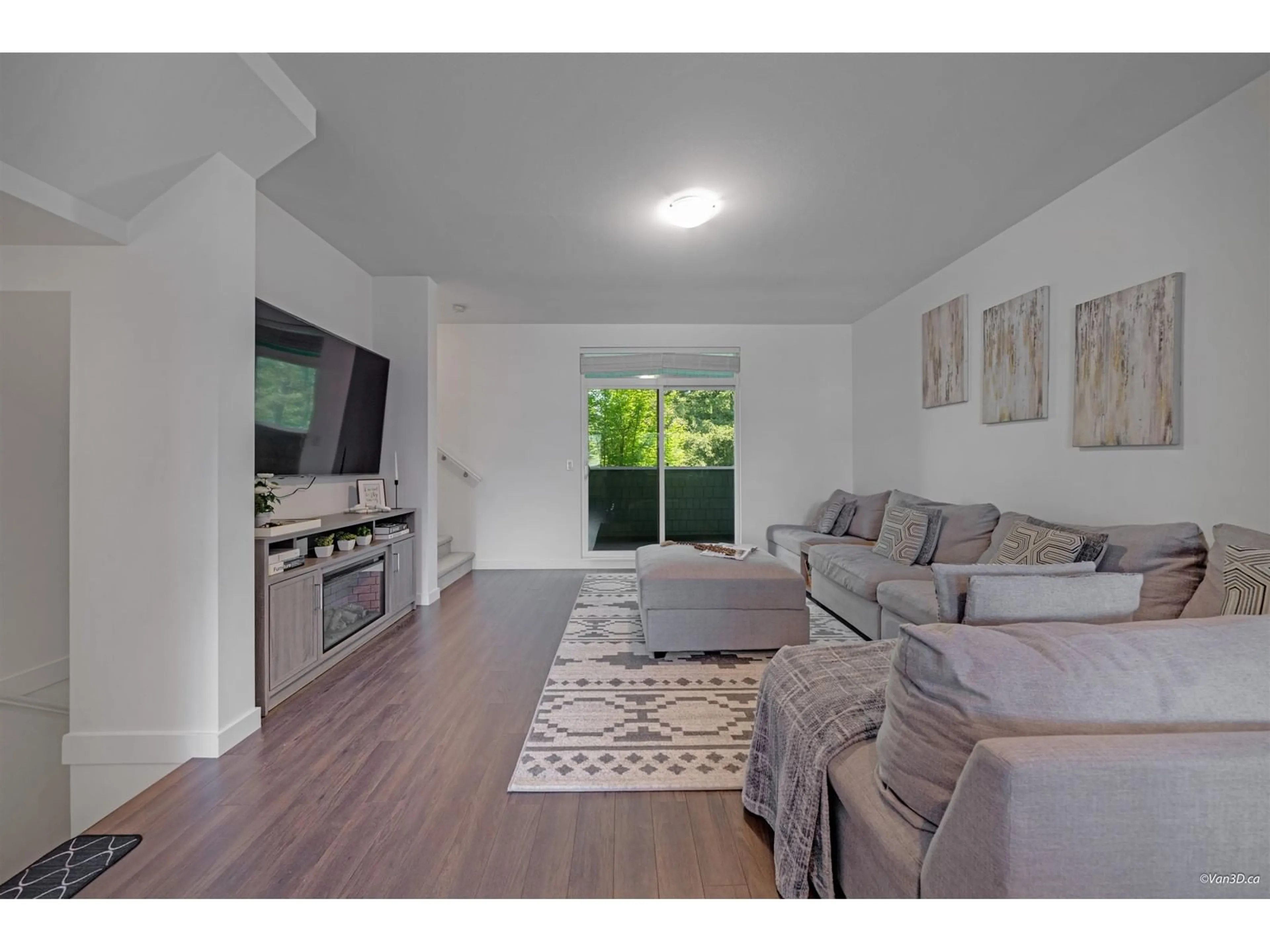 Living room with furniture, wood/laminate floor for 86 - 8168 136A, Surrey British Columbia V3W2Z6