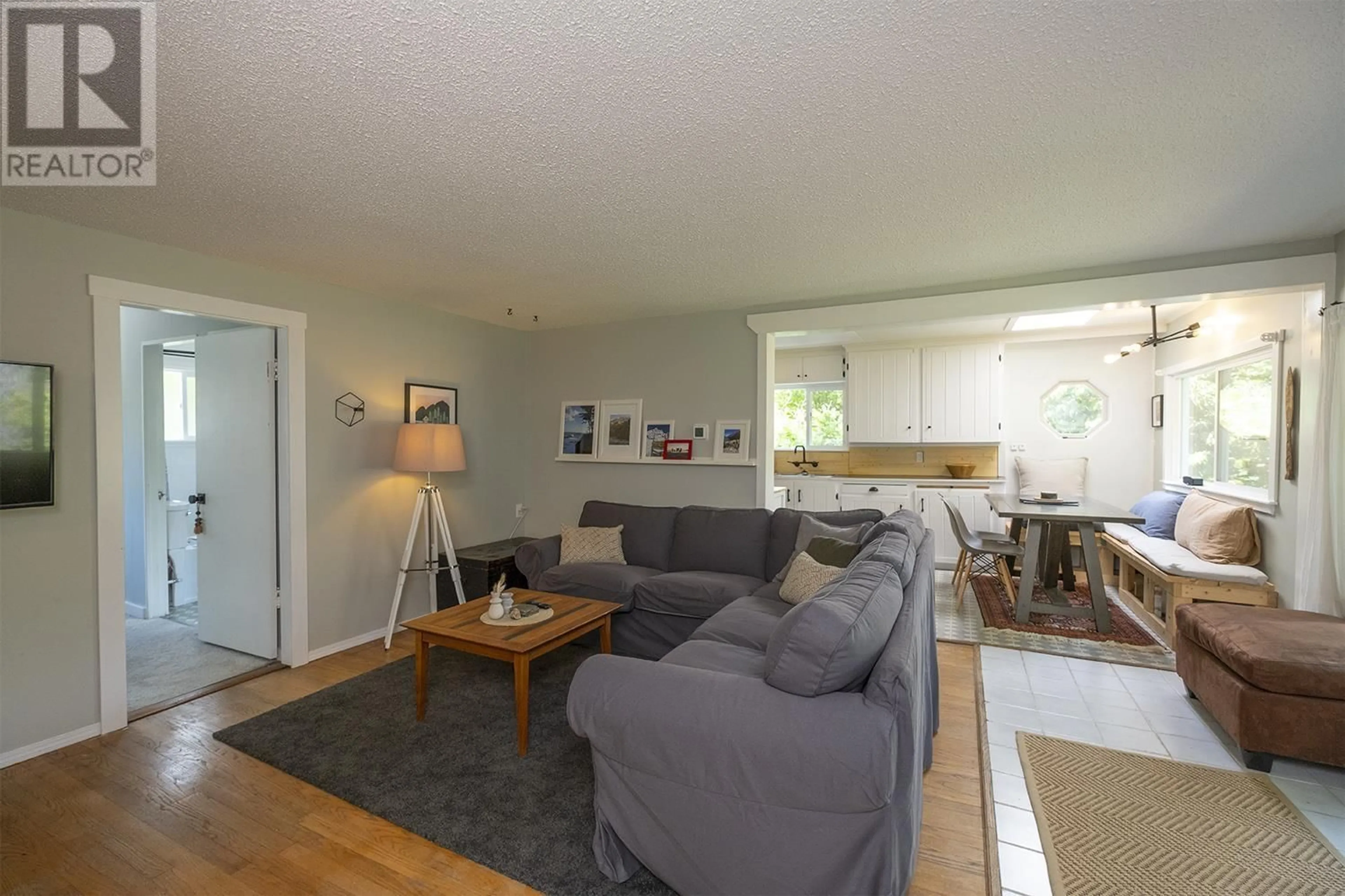 Living room with furniture, wood/laminate floor for 649 DOUGALL ROAD, Gibsons British Columbia V0N1V8