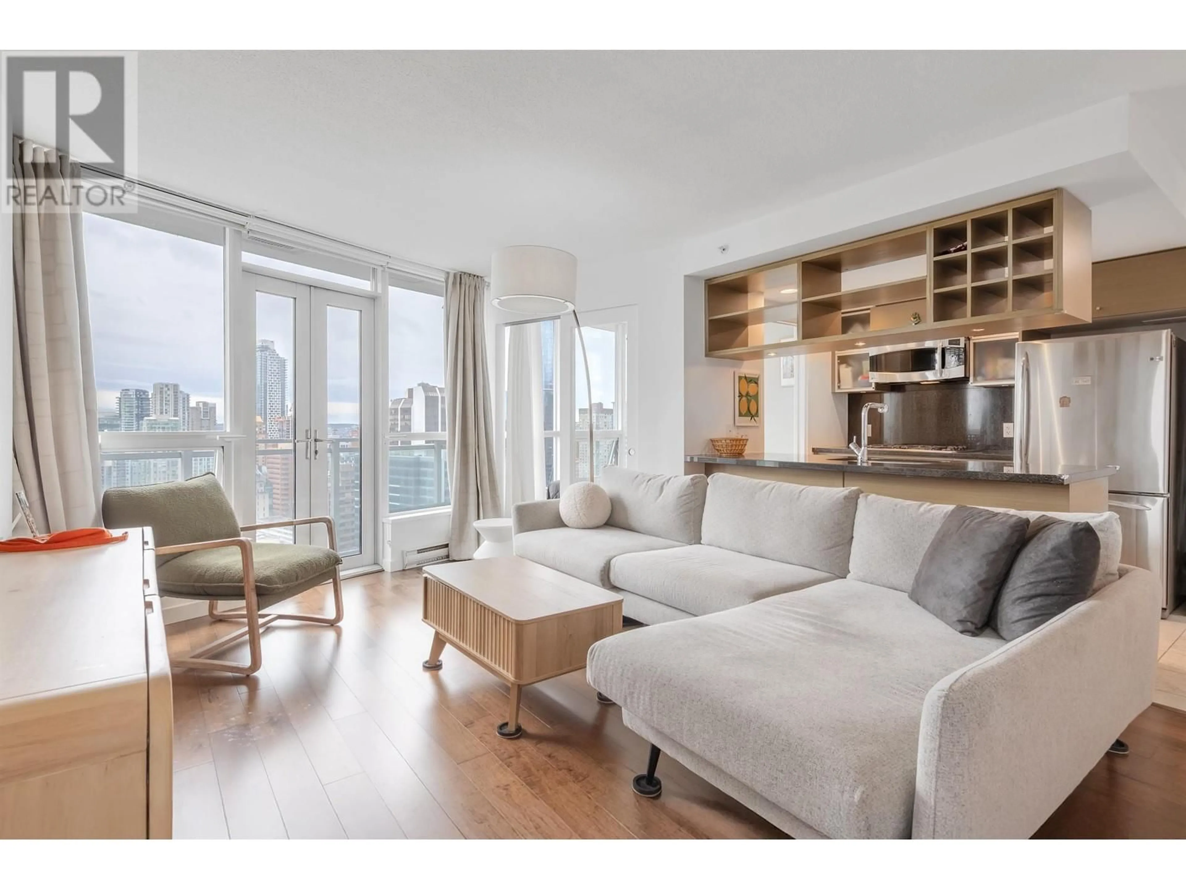 Living room with furniture, wood/laminate floor for 2406 - 833 SEYMOUR STREET, Vancouver British Columbia V6B0G4