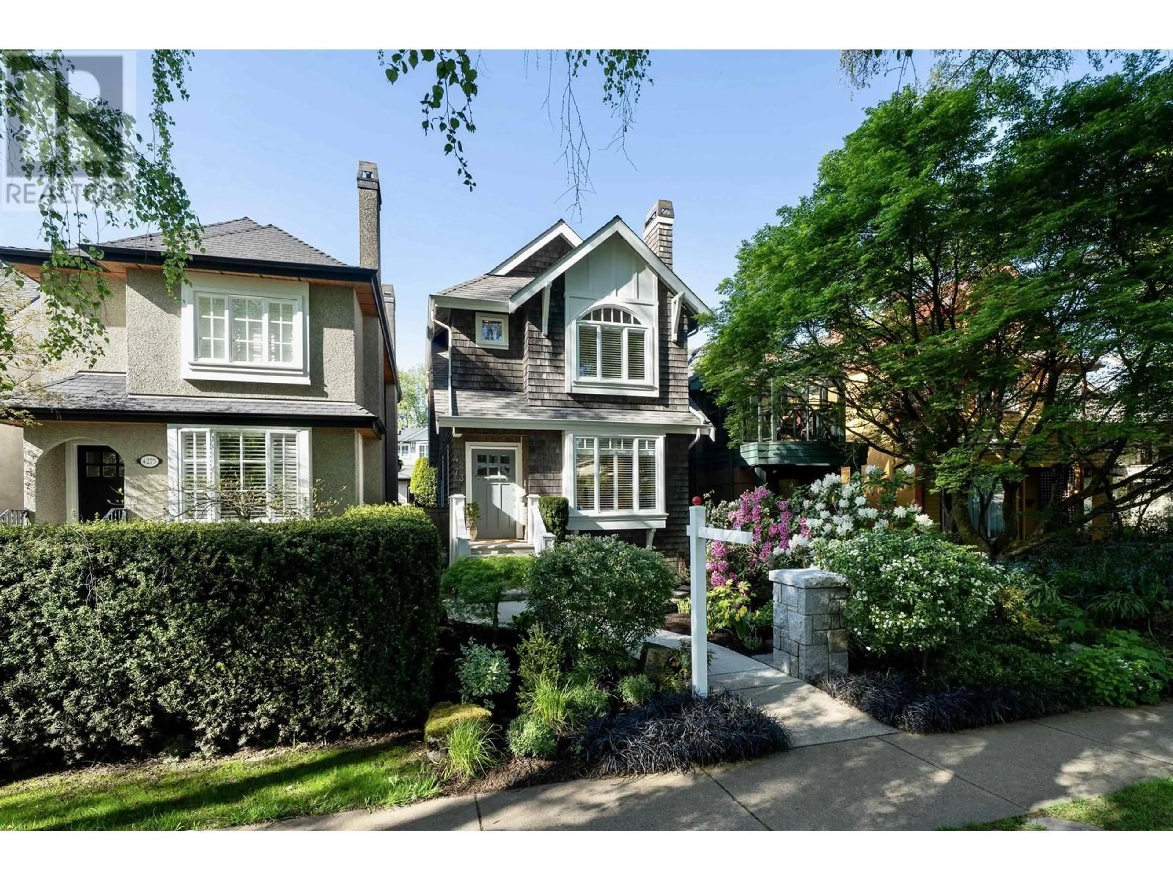 Home with brick exterior material, street for 4273 14TH AVENUE, Vancouver British Columbia V6R2X7