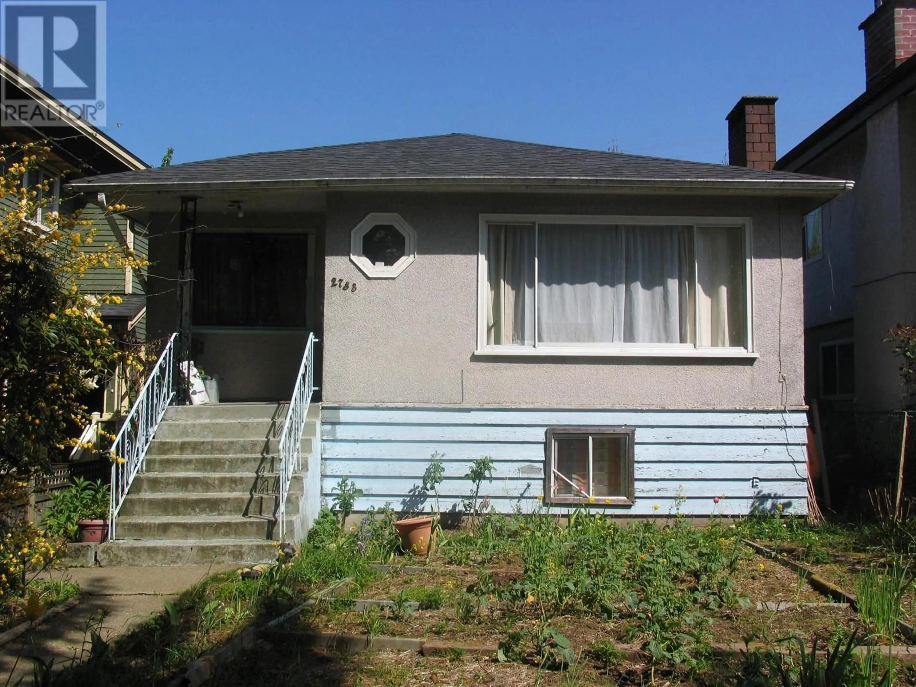 Home with vinyl exterior material, street for 2733 28TH AVENUE, Vancouver British Columbia V5R1S1